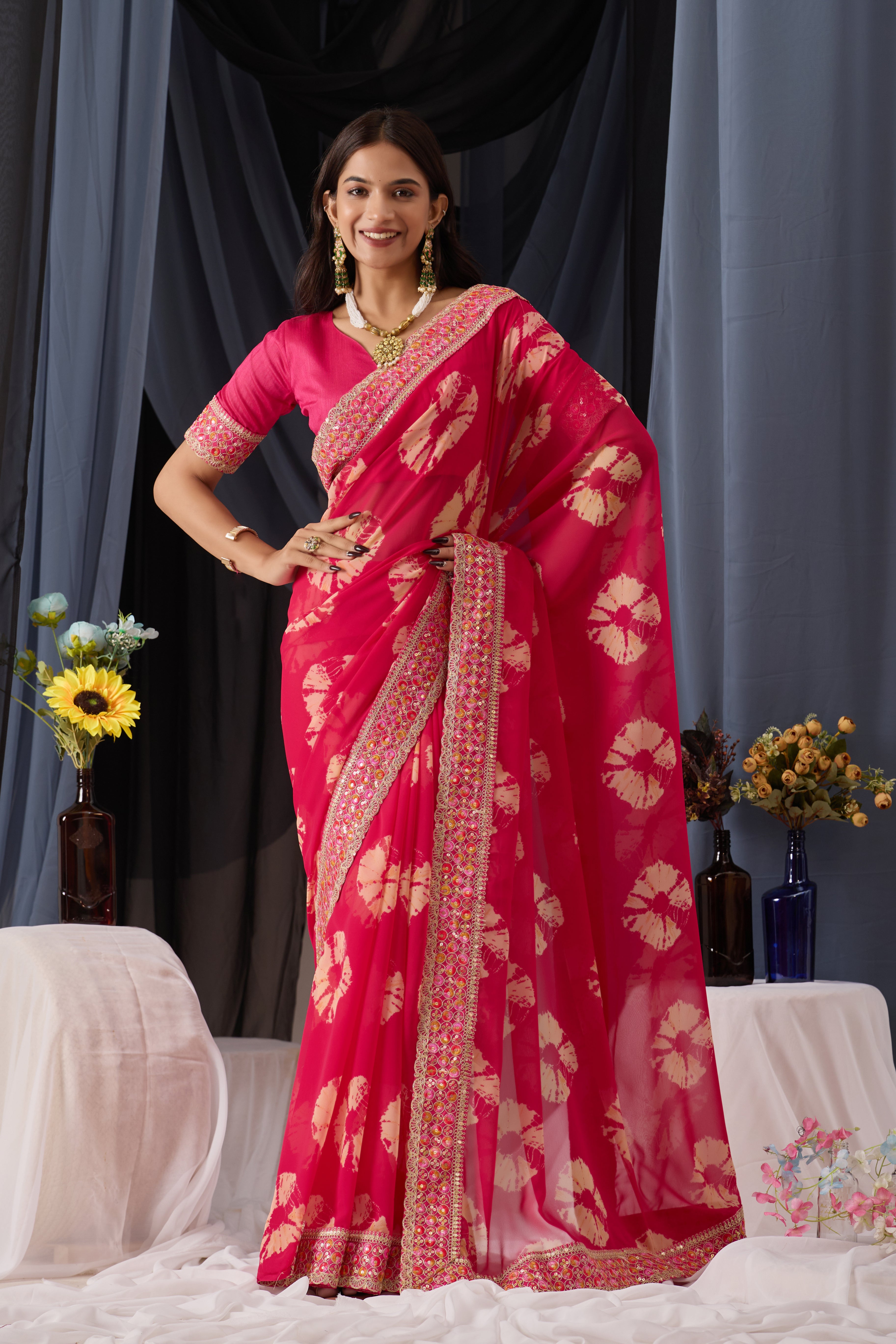 Scarlet Pink Batik Georgette Saree with Embroidered Border