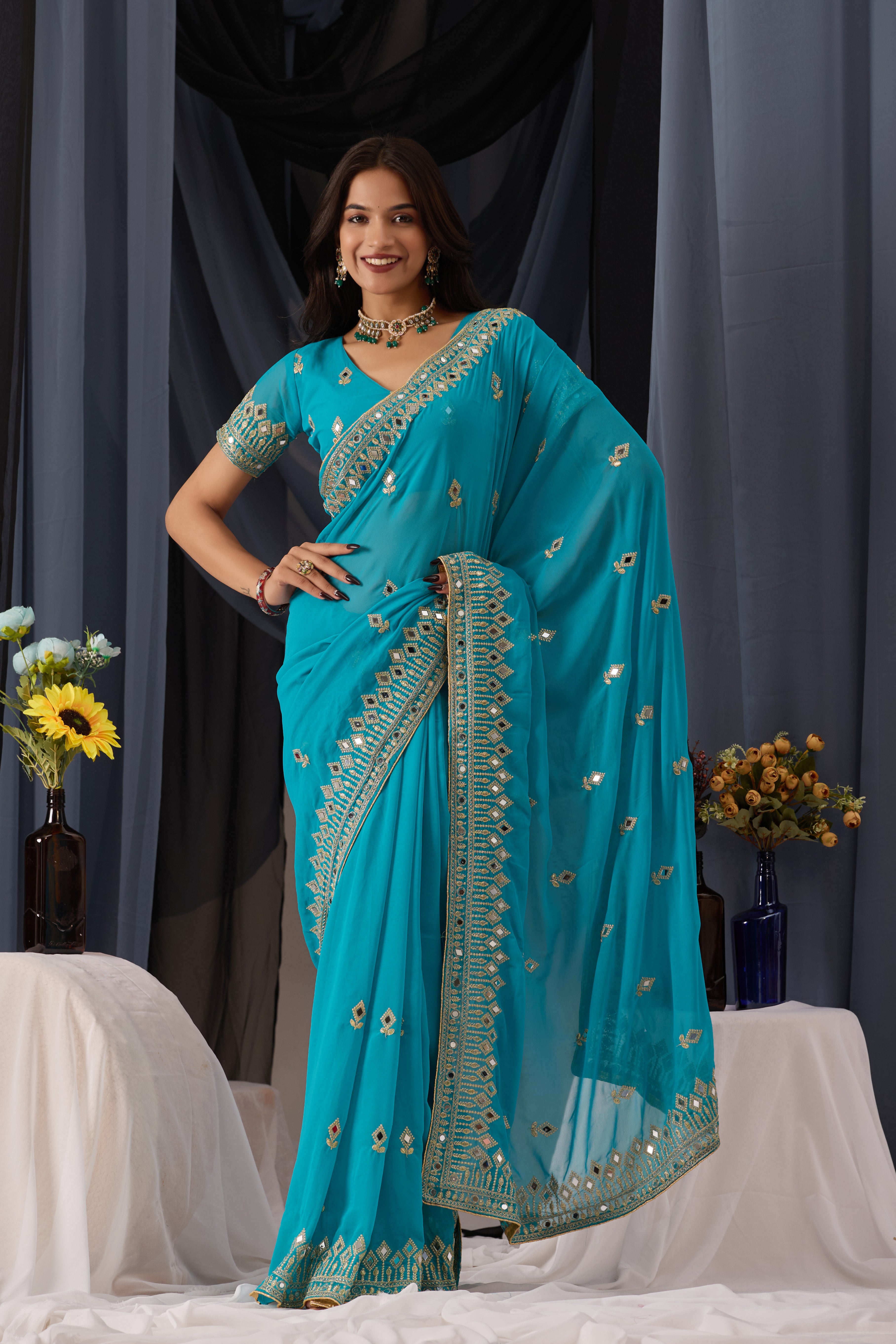 Elegant Sky Georgette Saree with Golden Embroidered Border