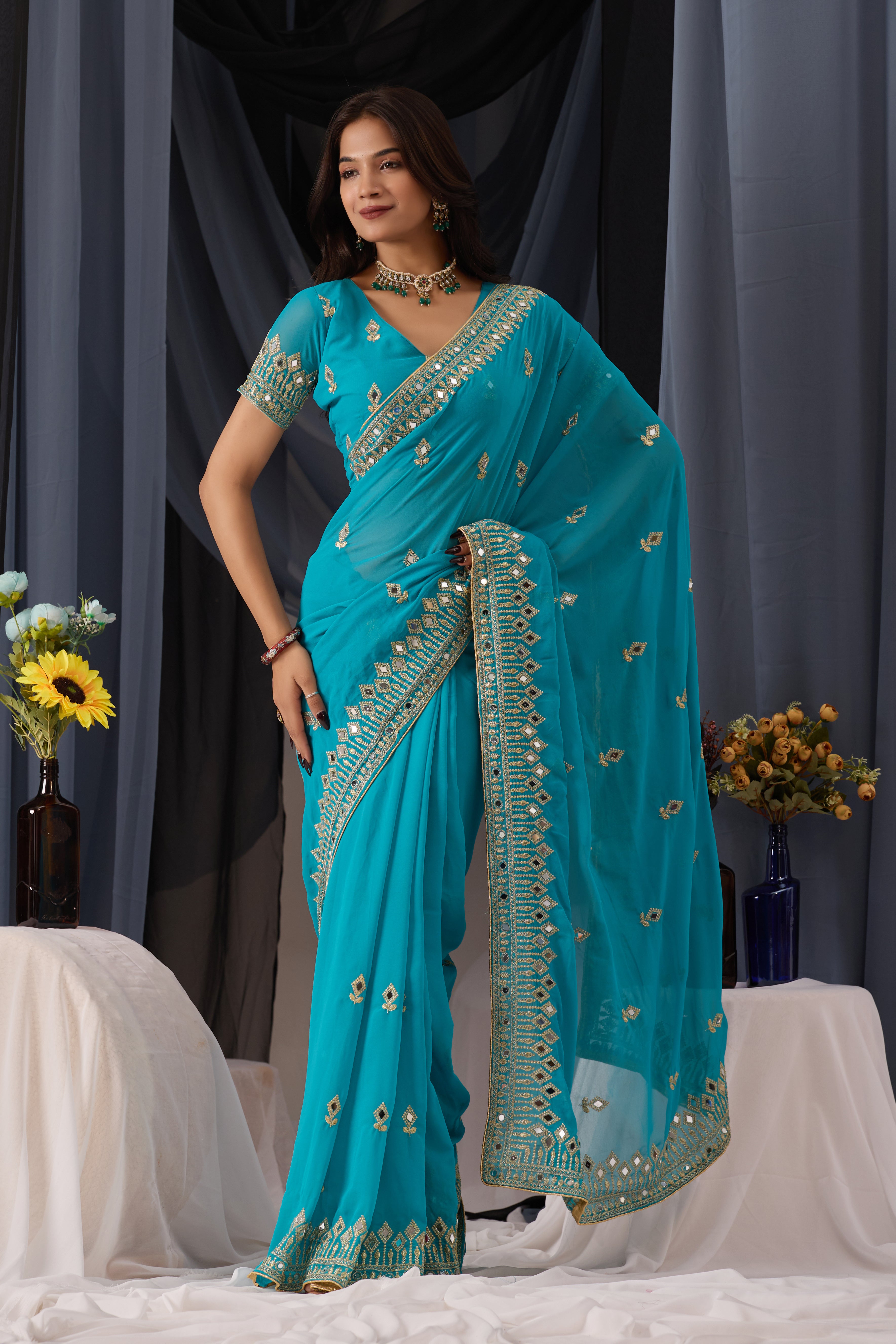 Elegant Sky Georgette Saree with Golden Embroidered Border