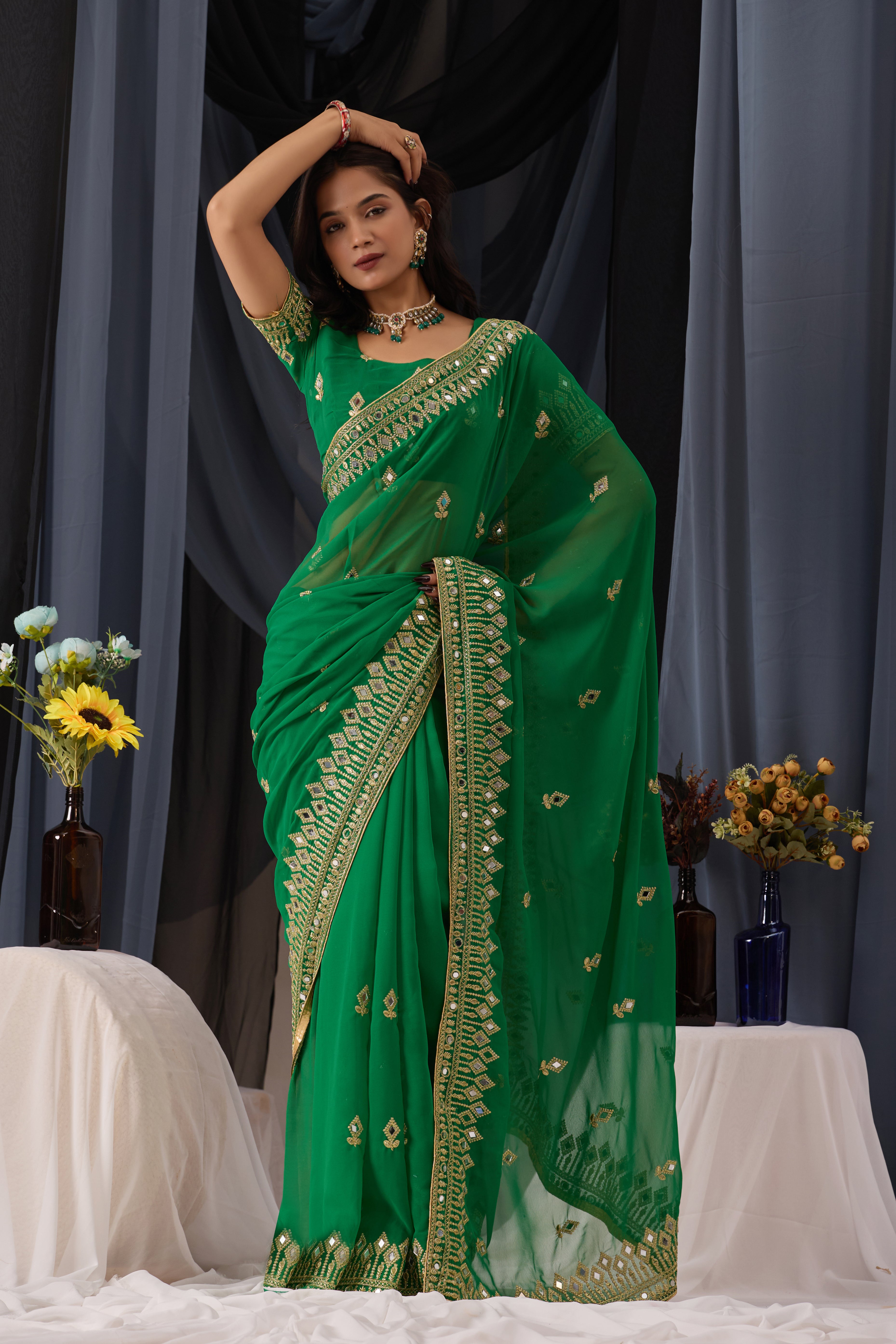 Elegant Green Georgette Saree with Golden Embroidered Border