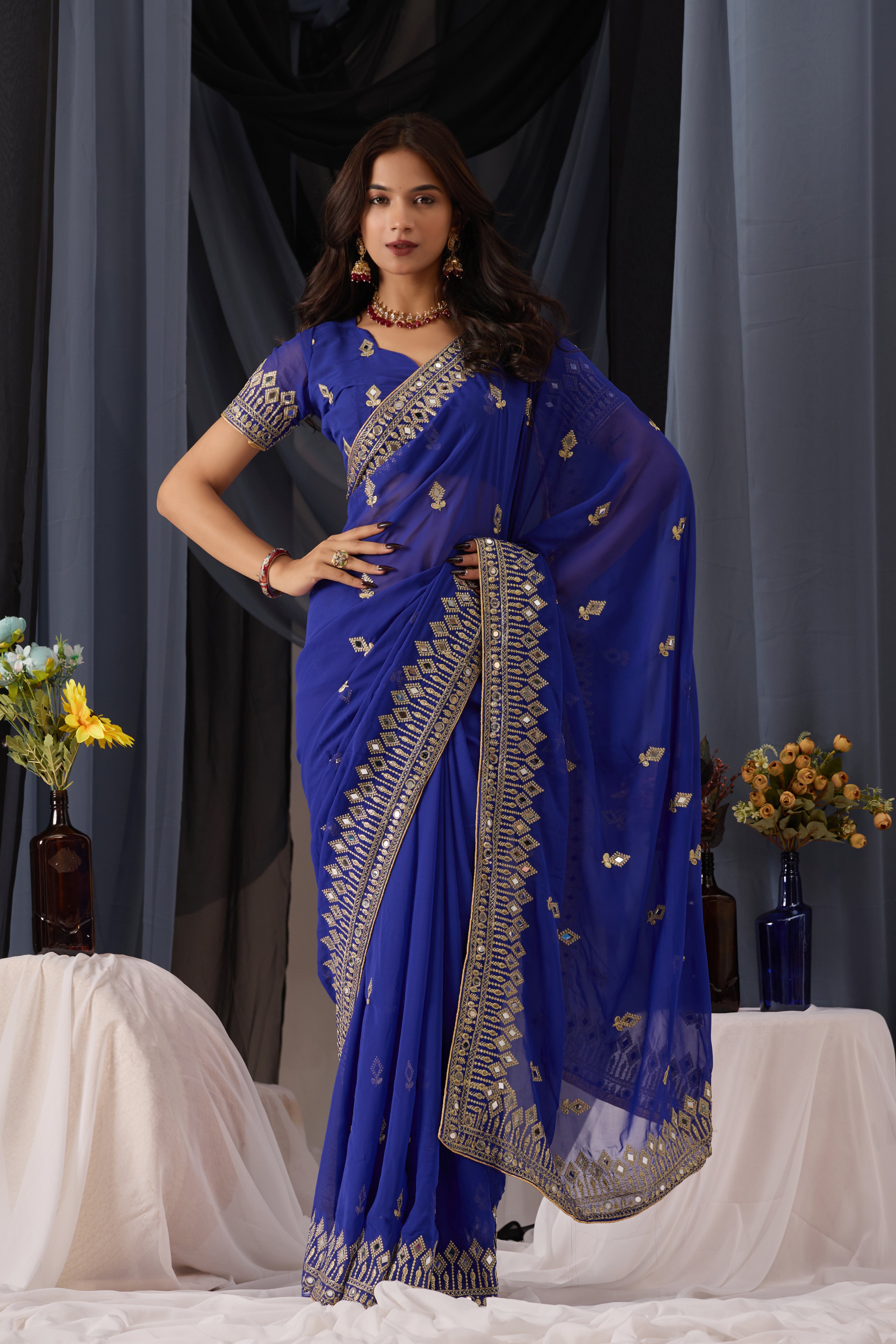 Elegant Blue Georgette Saree with Golden Embroidered Border