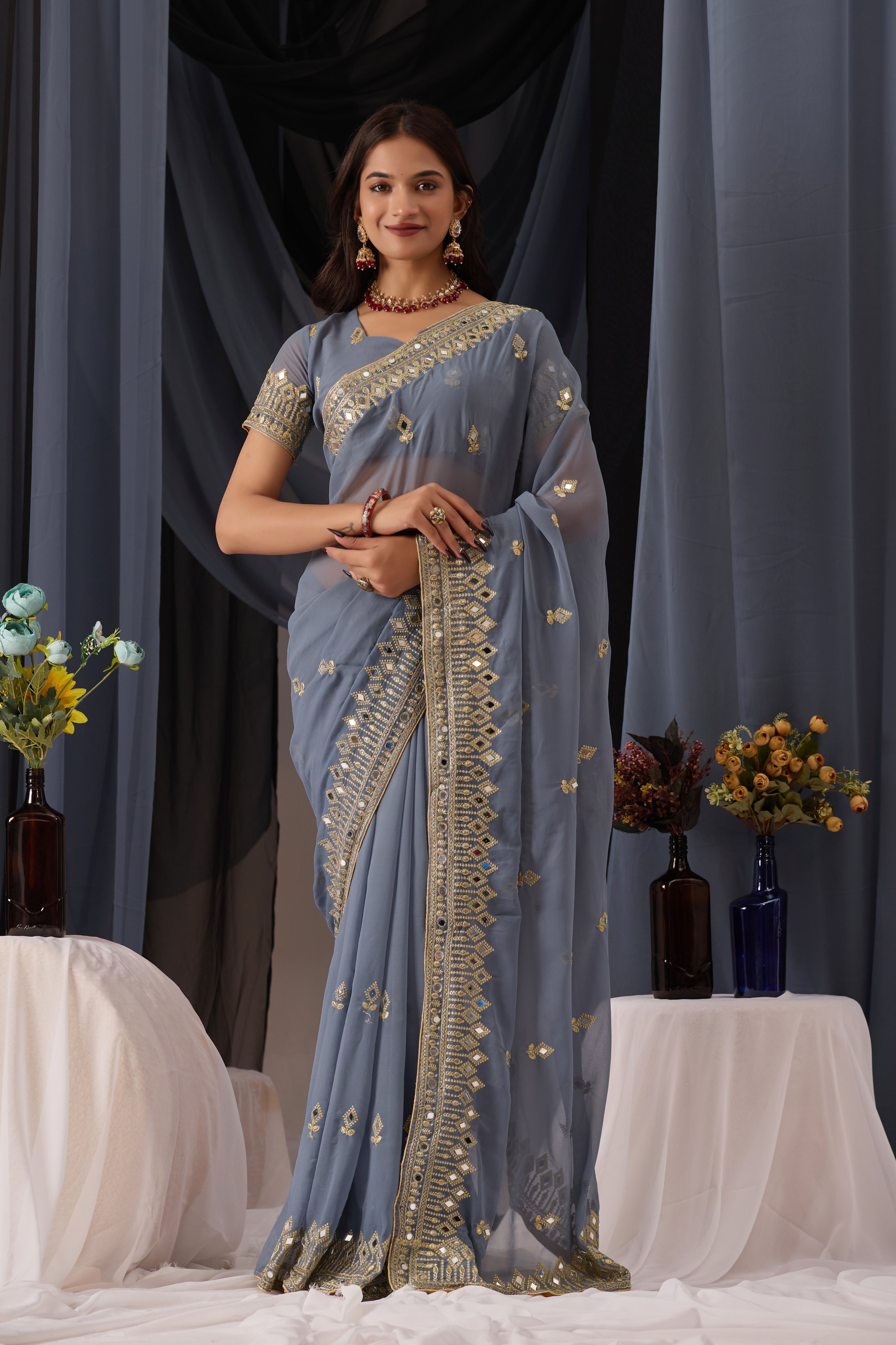 Elegant Gray Georgette Saree with Golden Embroidered Border
