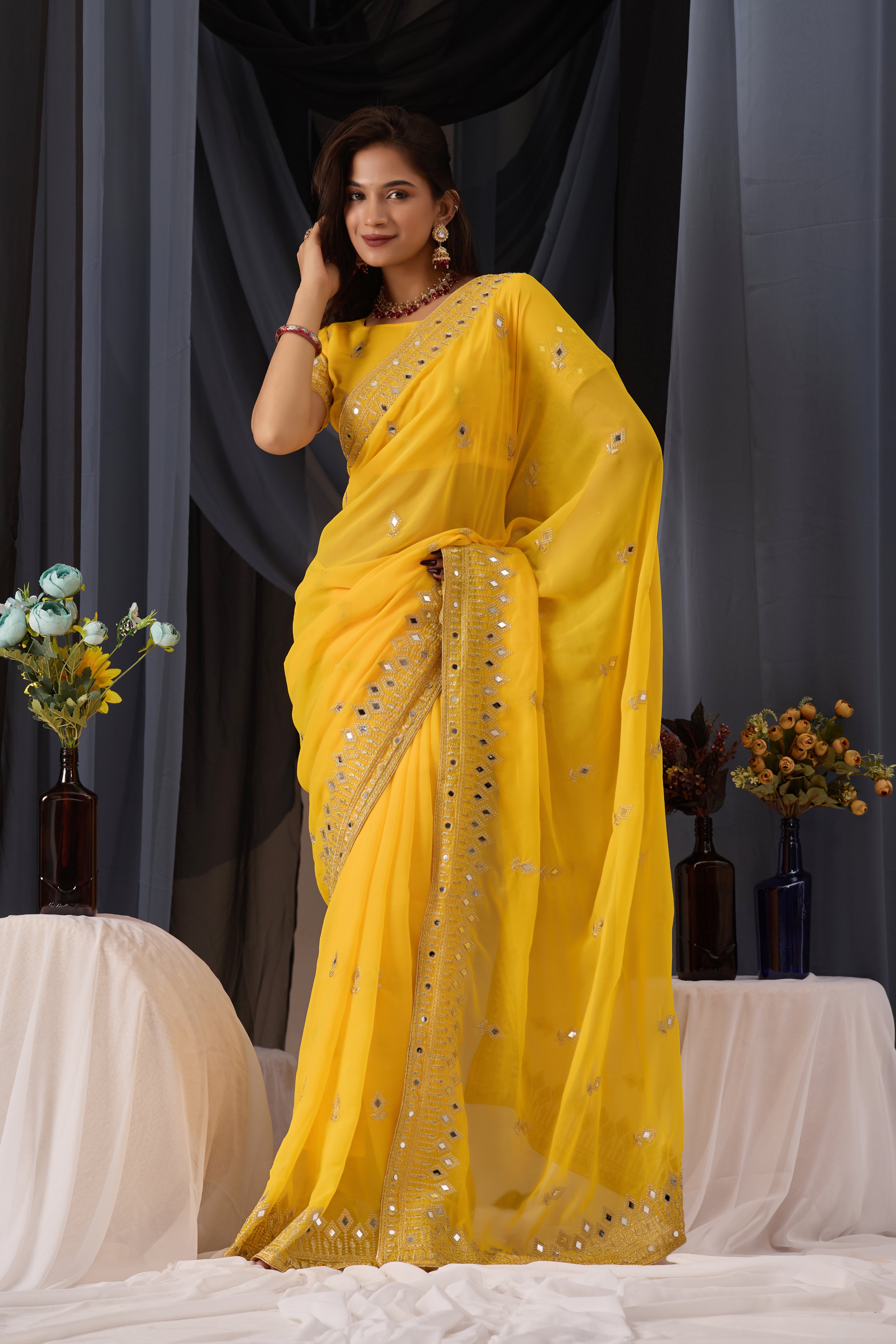 Elegant Yellow Georgette Saree with Golden Embroidered Border