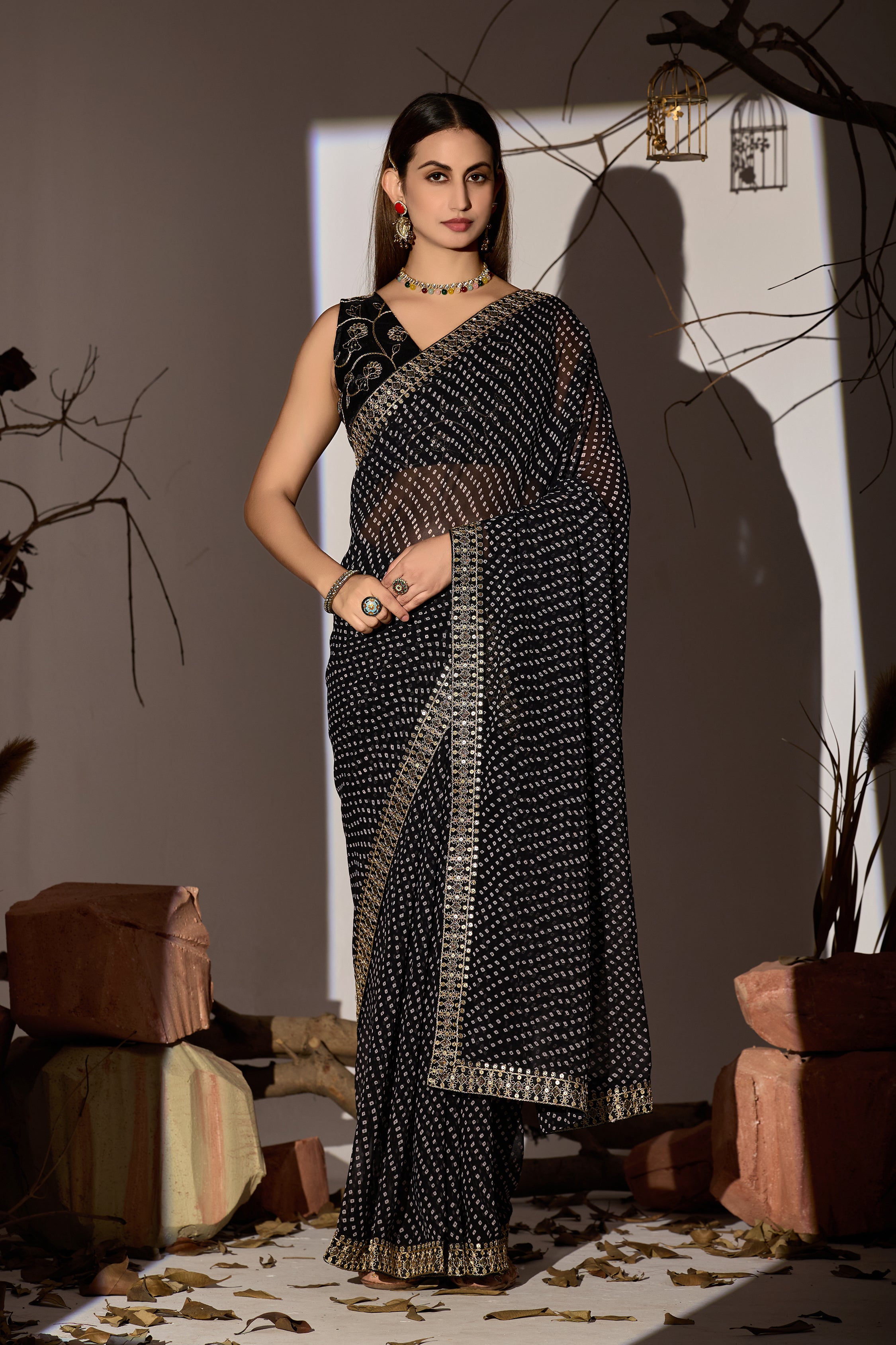 Midnight Elegance Black Georgette Saree with Golden Embellished Border