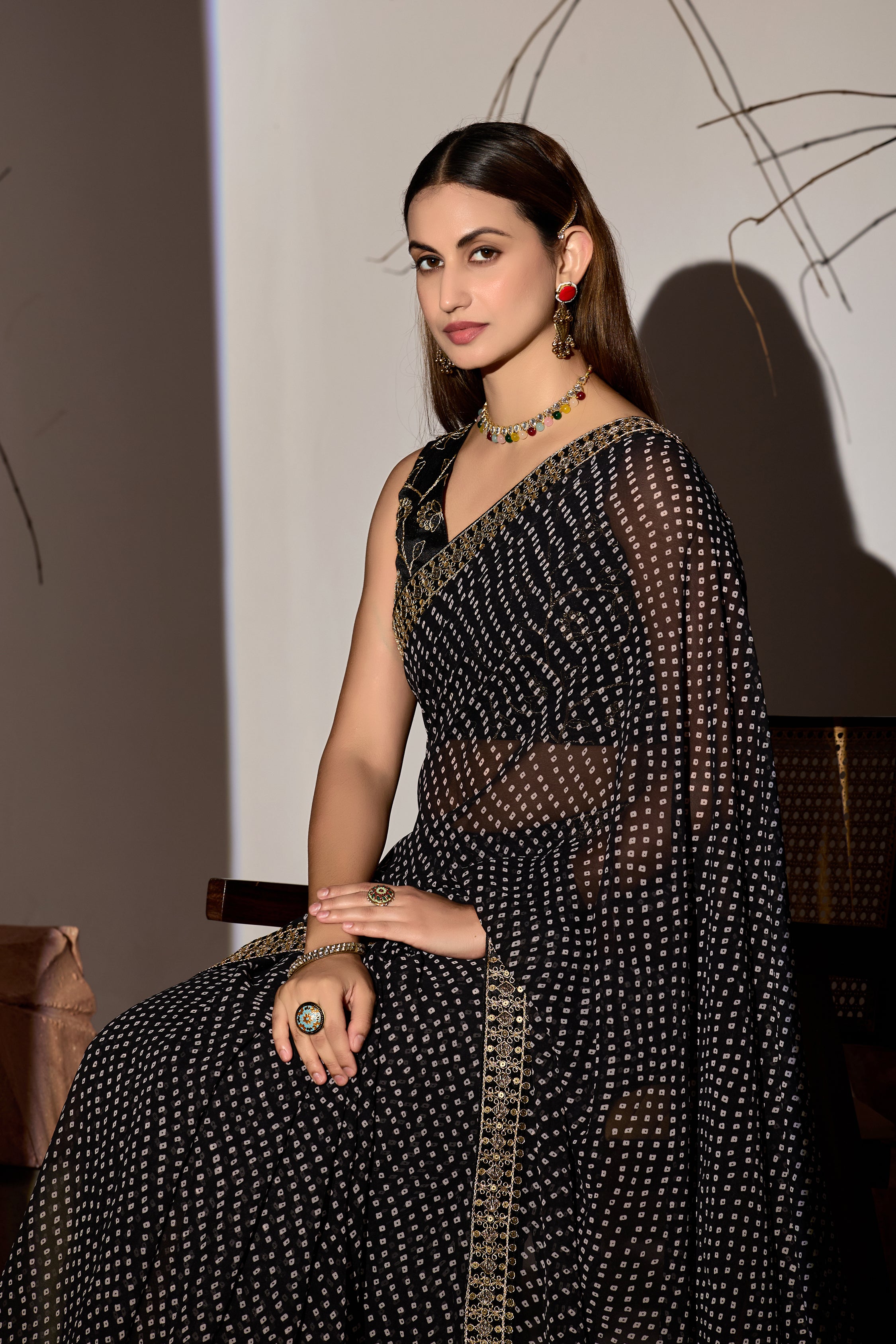 Midnight Elegance Black Georgette Saree with Golden Embellished Border