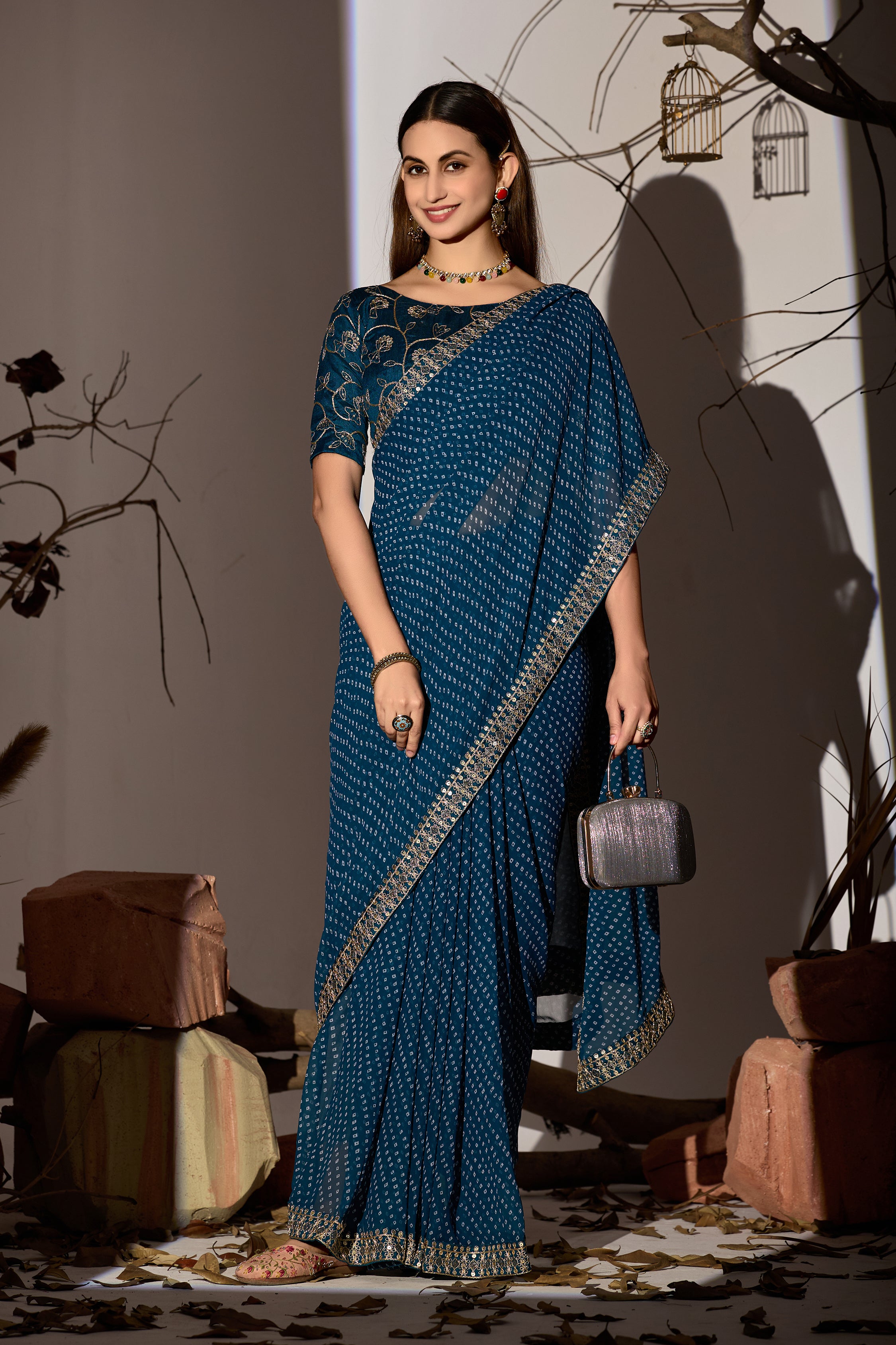 Midnight Elegance Georgette Saree with Golden Embellished Border