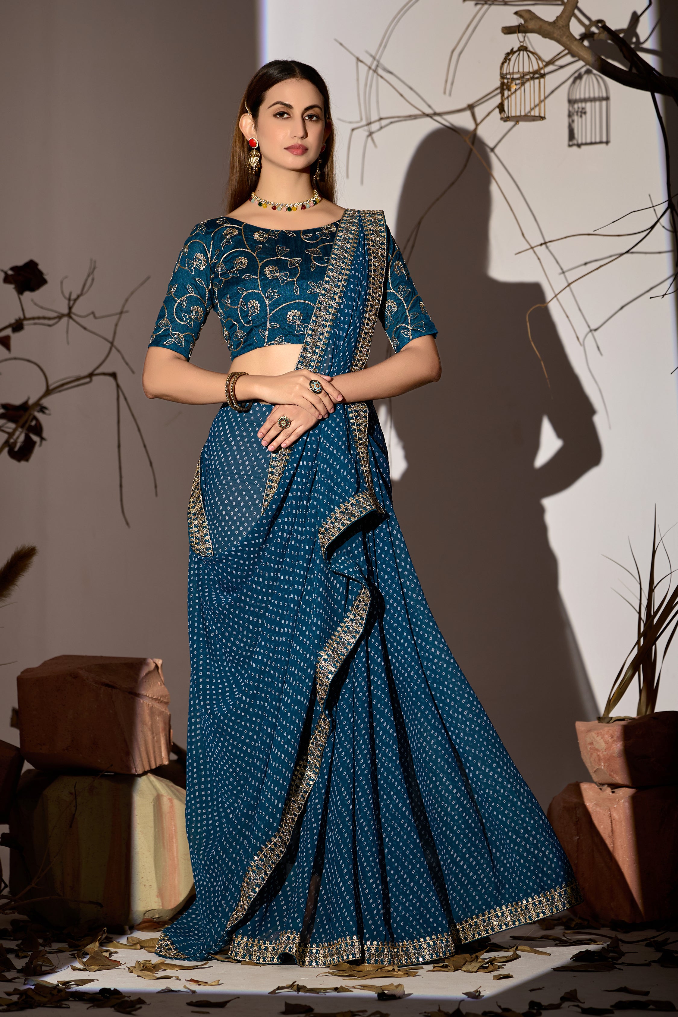 Midnight Elegance Georgette Saree with Golden Embellished Border