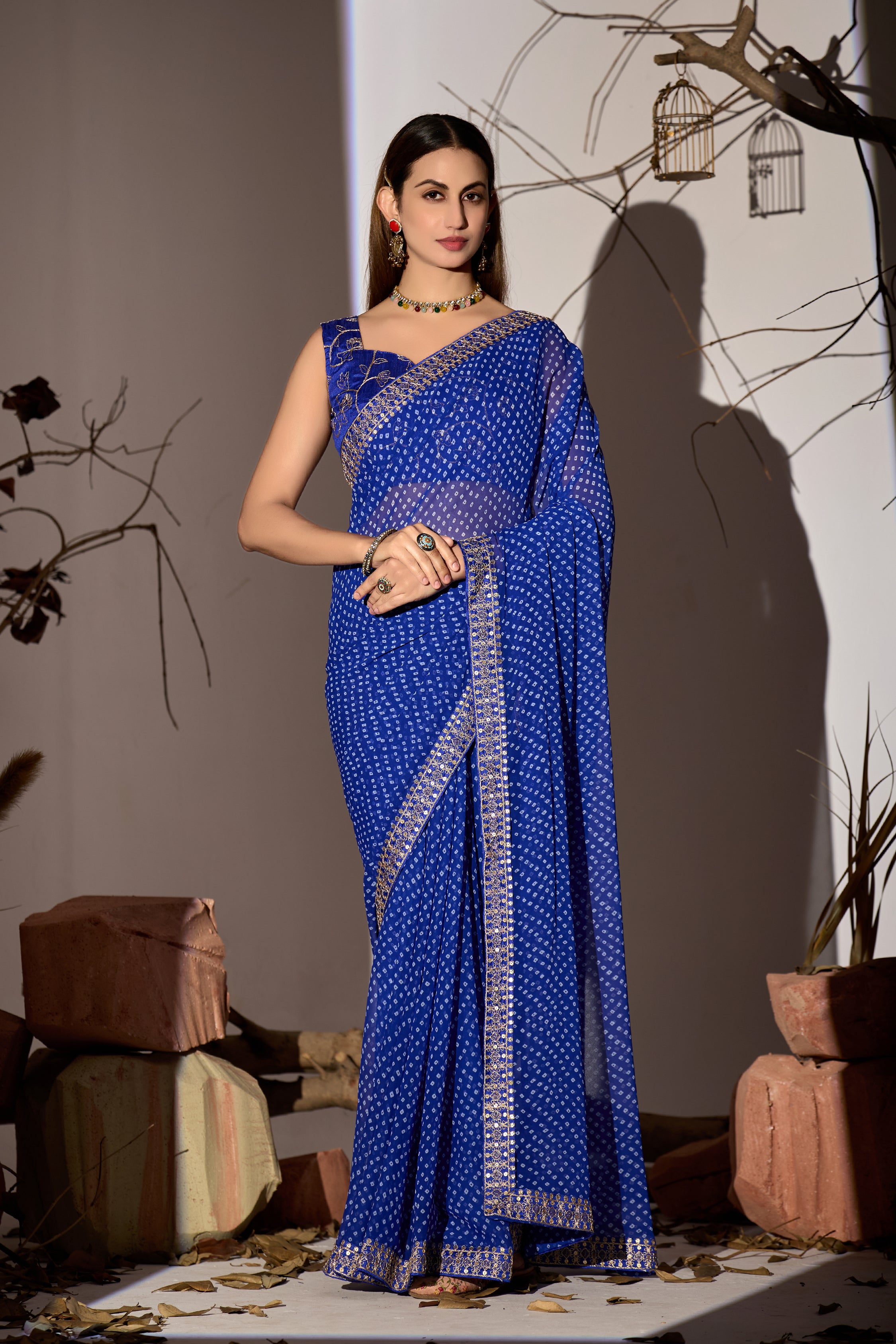 Midnight Elegance Royal Blue Georgette Saree with Golden Embellished Border