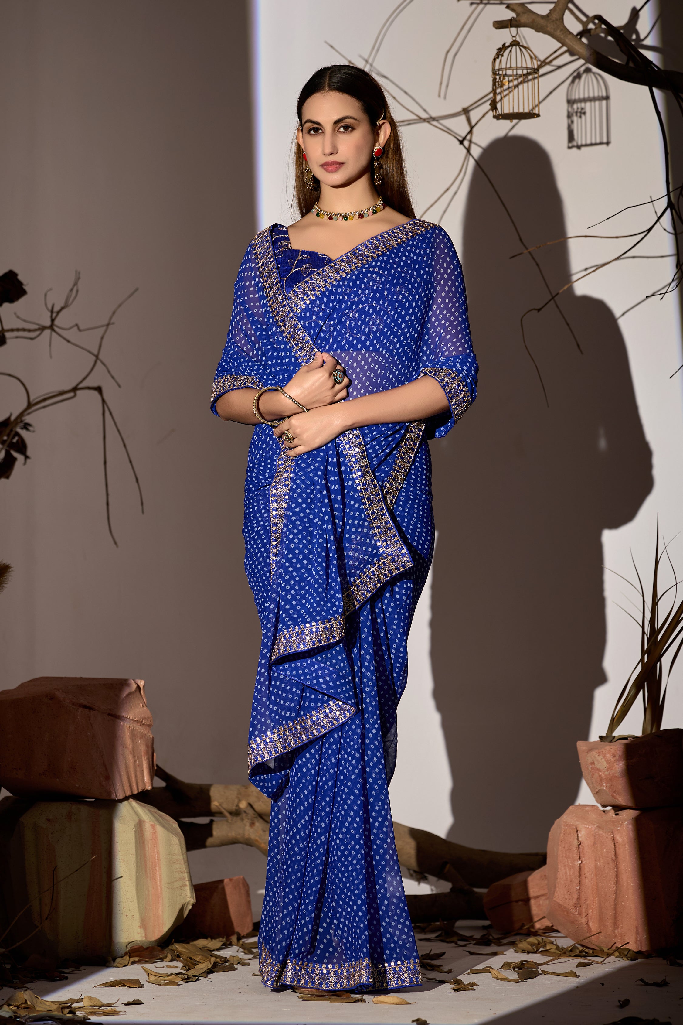 Midnight Elegance Royal Blue Georgette Saree with Golden Embellished Border