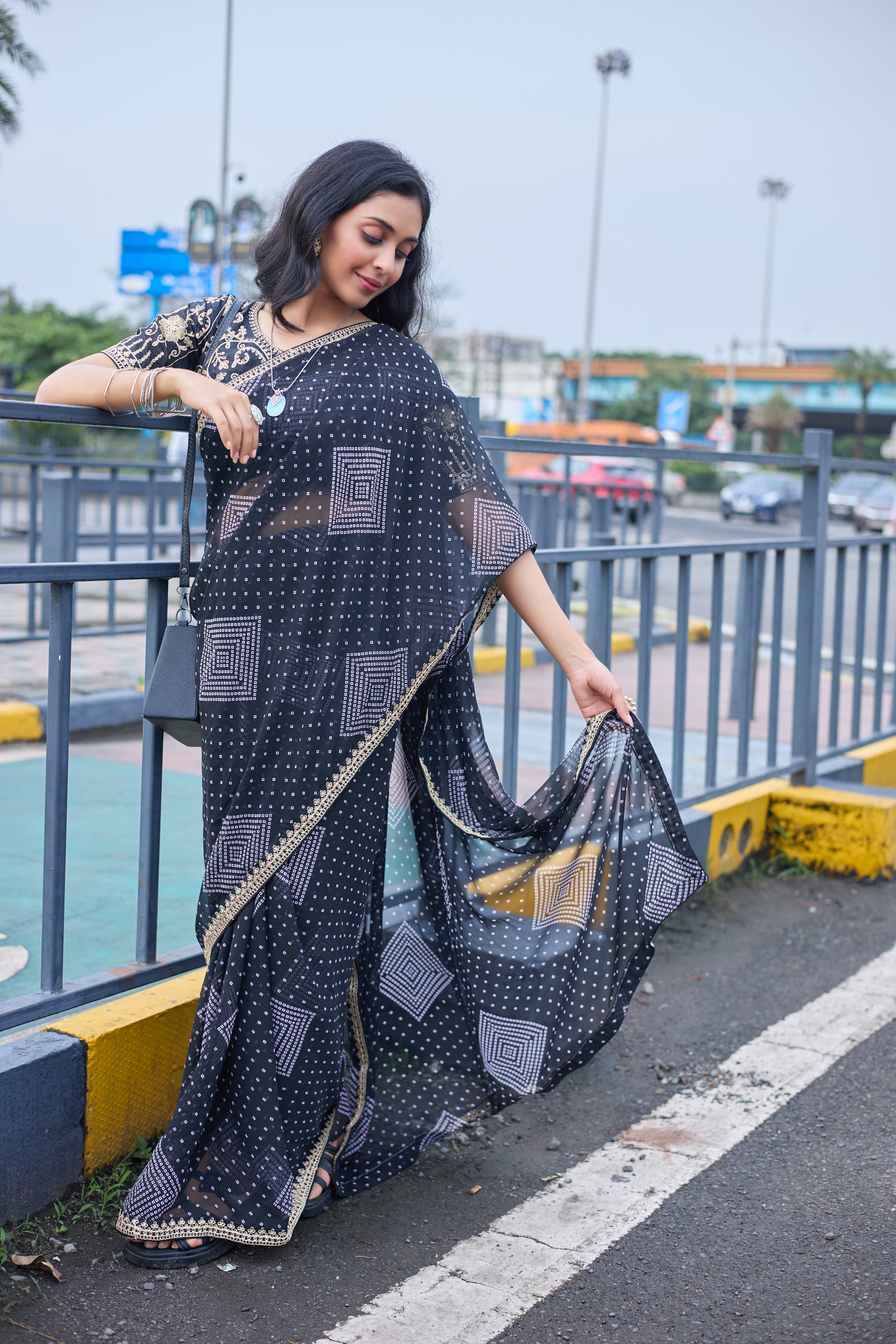 Midnight Charm Black Printed Saree with Golden Lace Border
