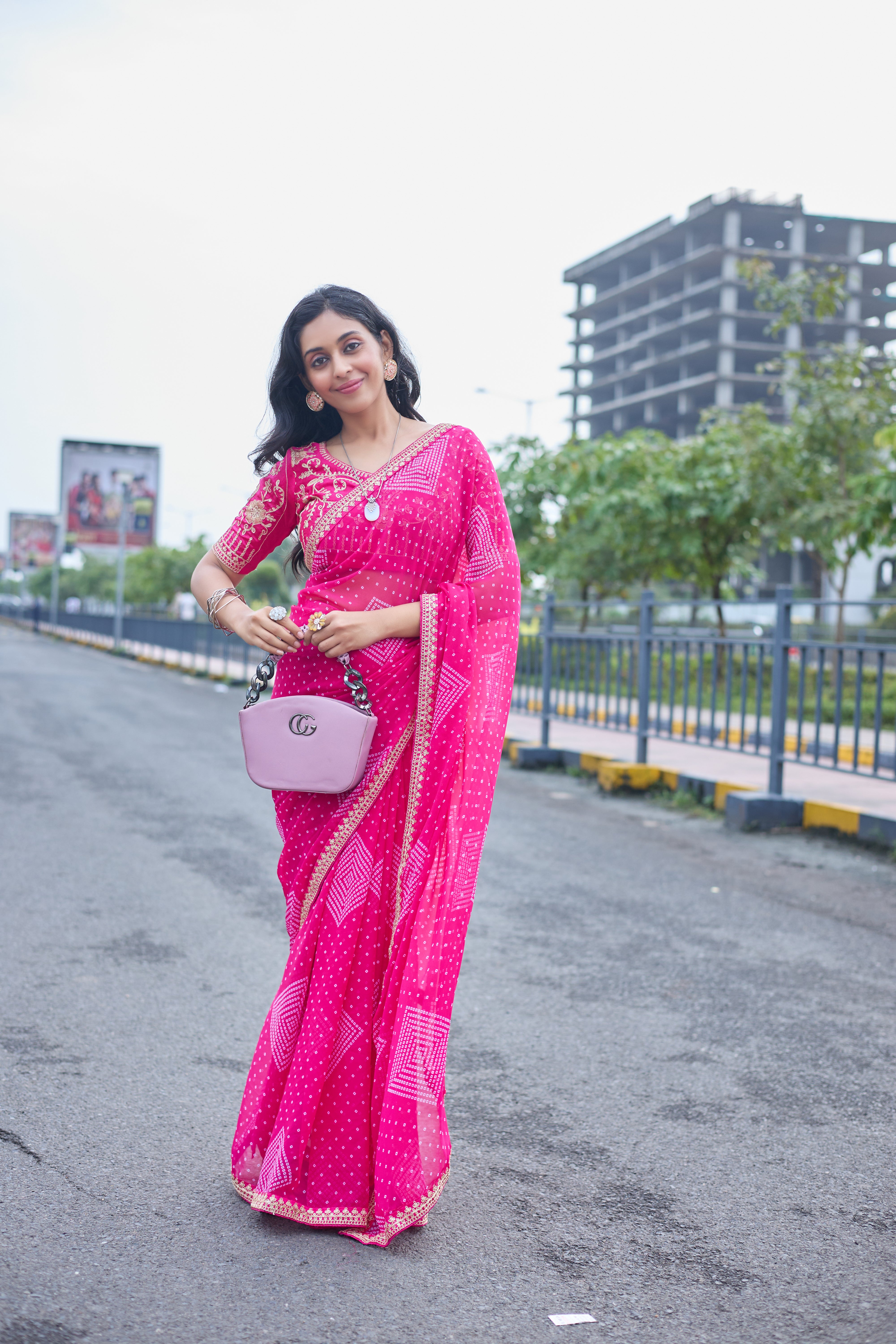 Fuchsia Radiance Bandhani Georgette Saree with Golden Lace Border