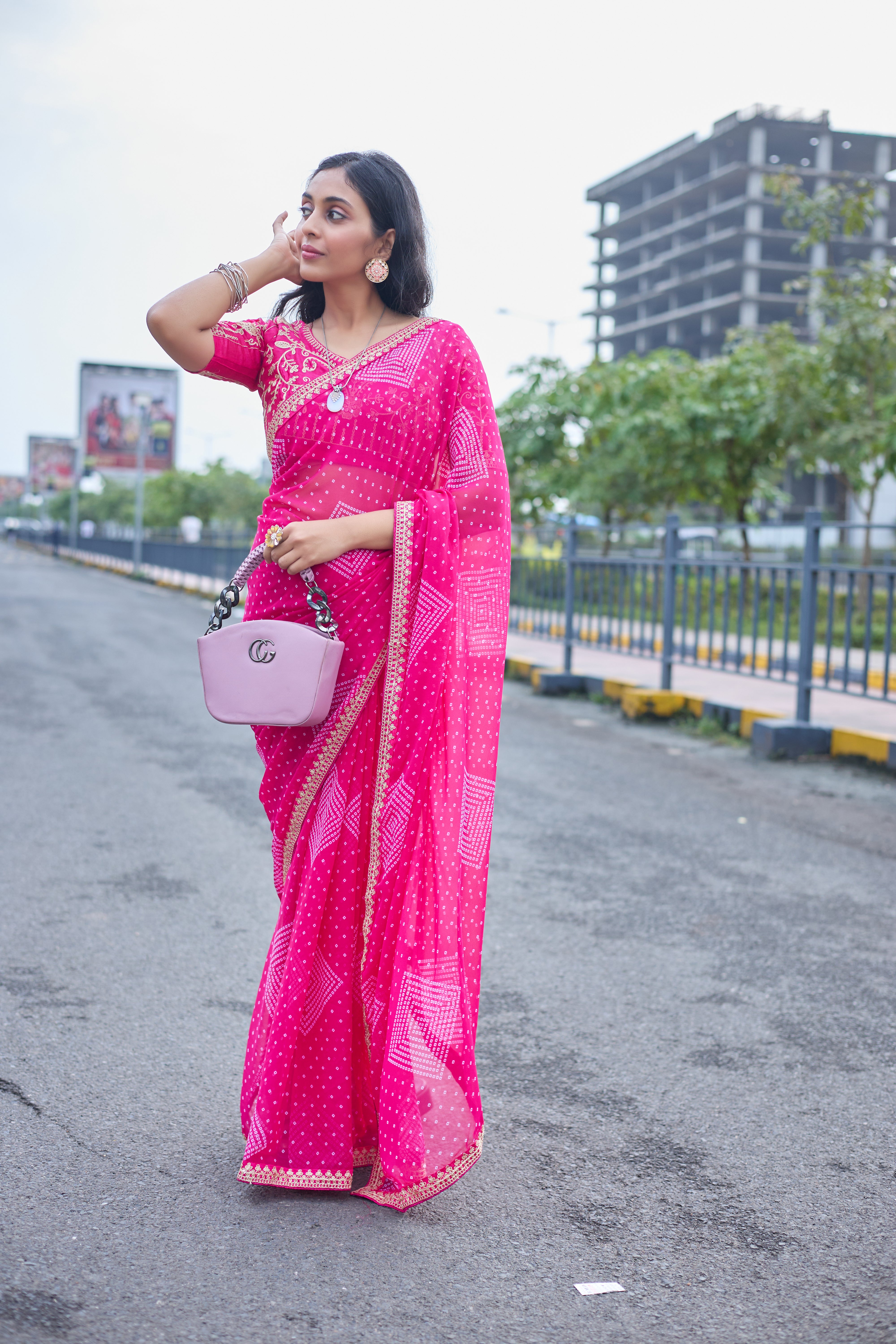 Fuchsia Radiance Bandhani Georgette Saree with Golden Lace Border