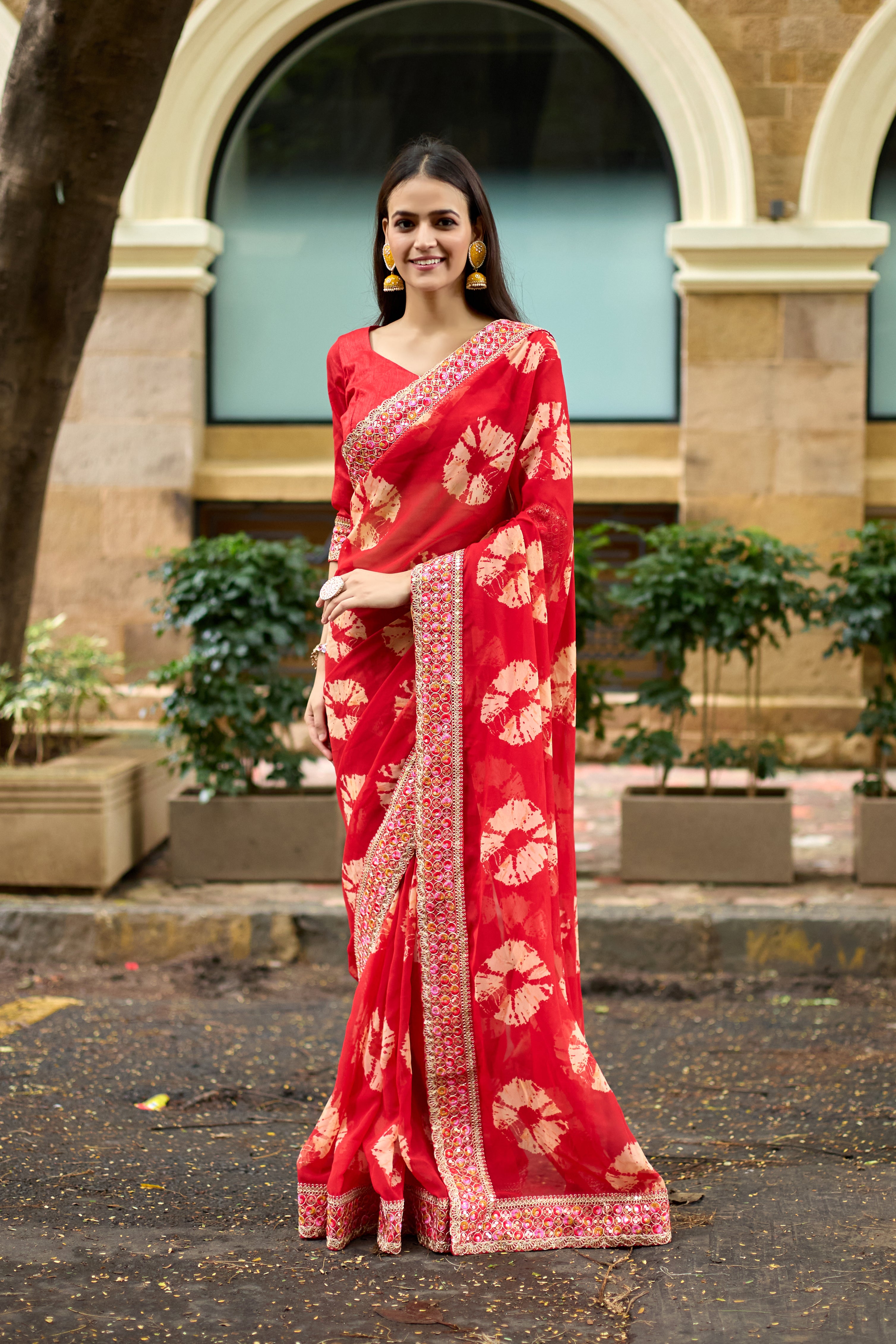 Vibrant Red Batik Georgette Saree with Embroidered Border