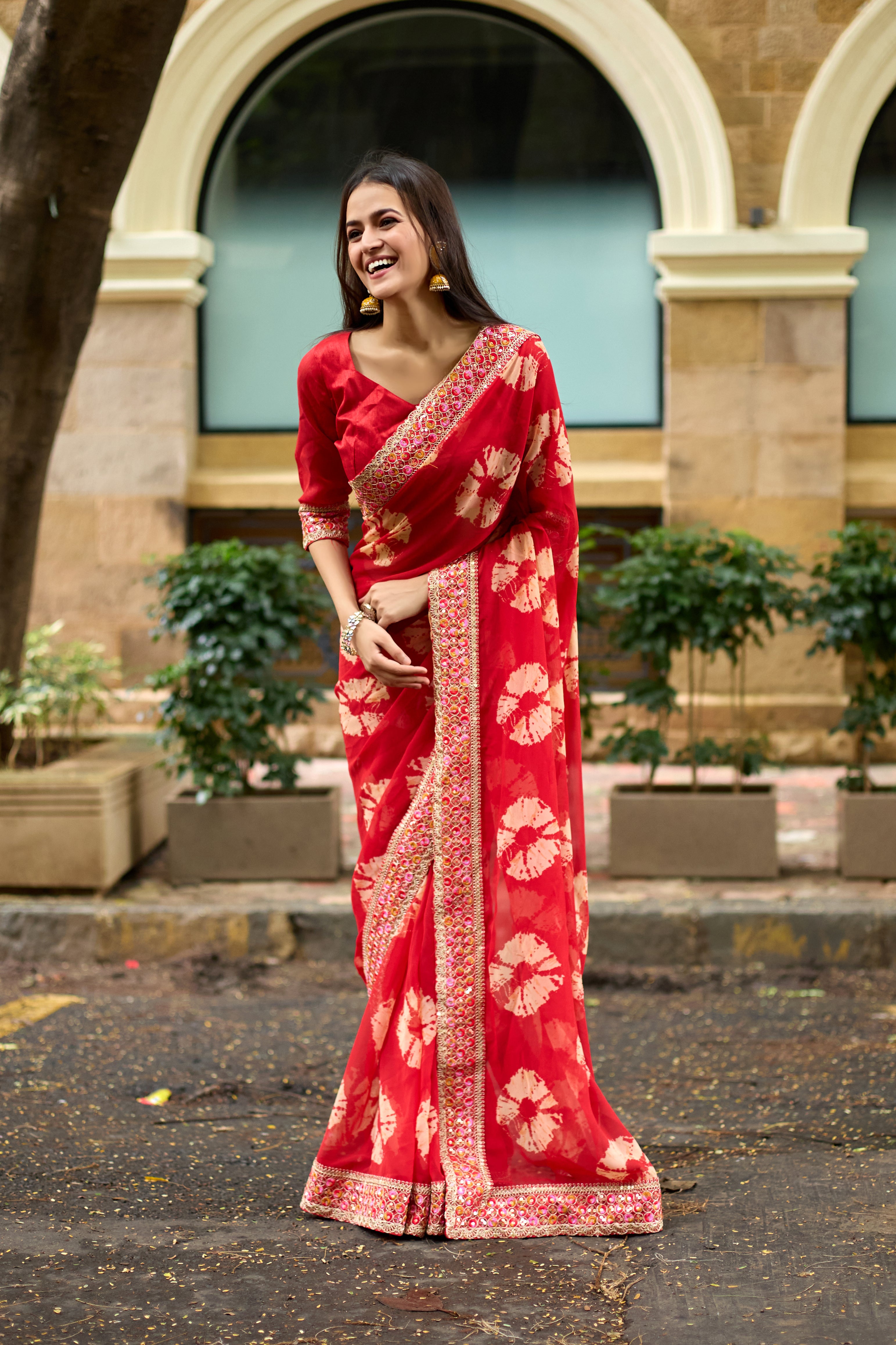 Vibrant Red Batik Georgette Saree with Embroidered Border
