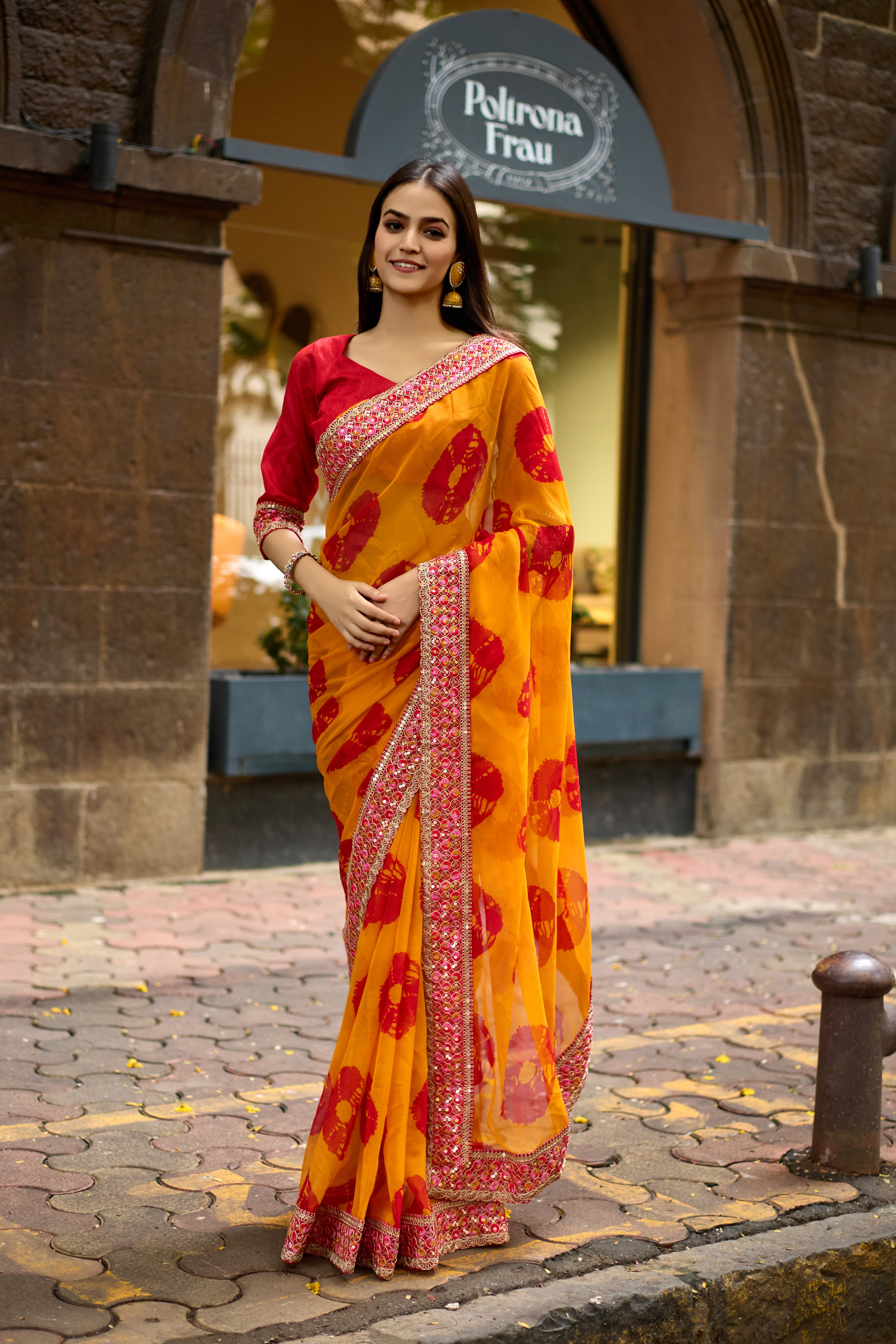 Vibrant Musted Batik Georgette Saree with Embroidered Border
