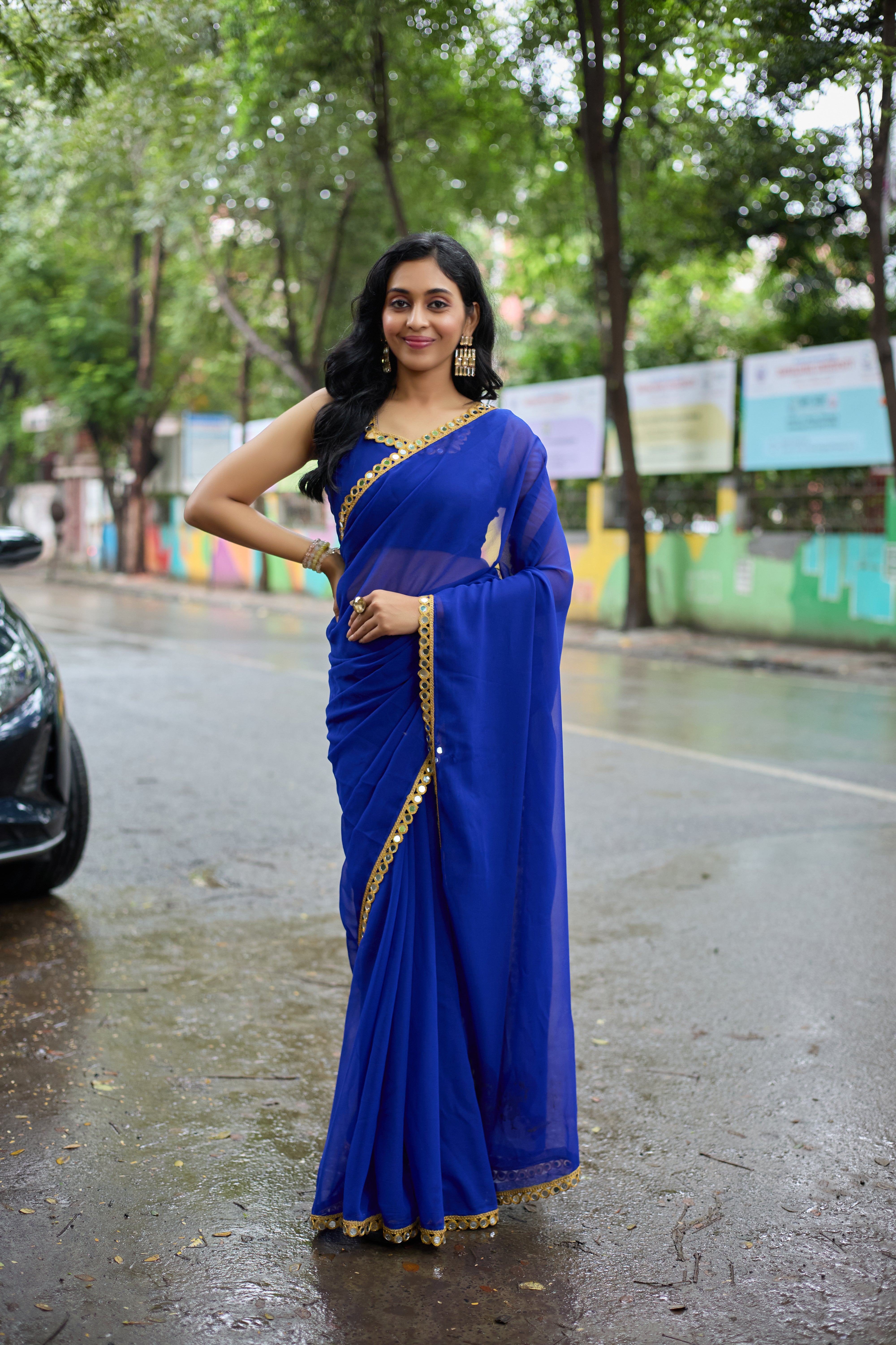 Royal Elegance Blue Georgette Saree with Golden Border