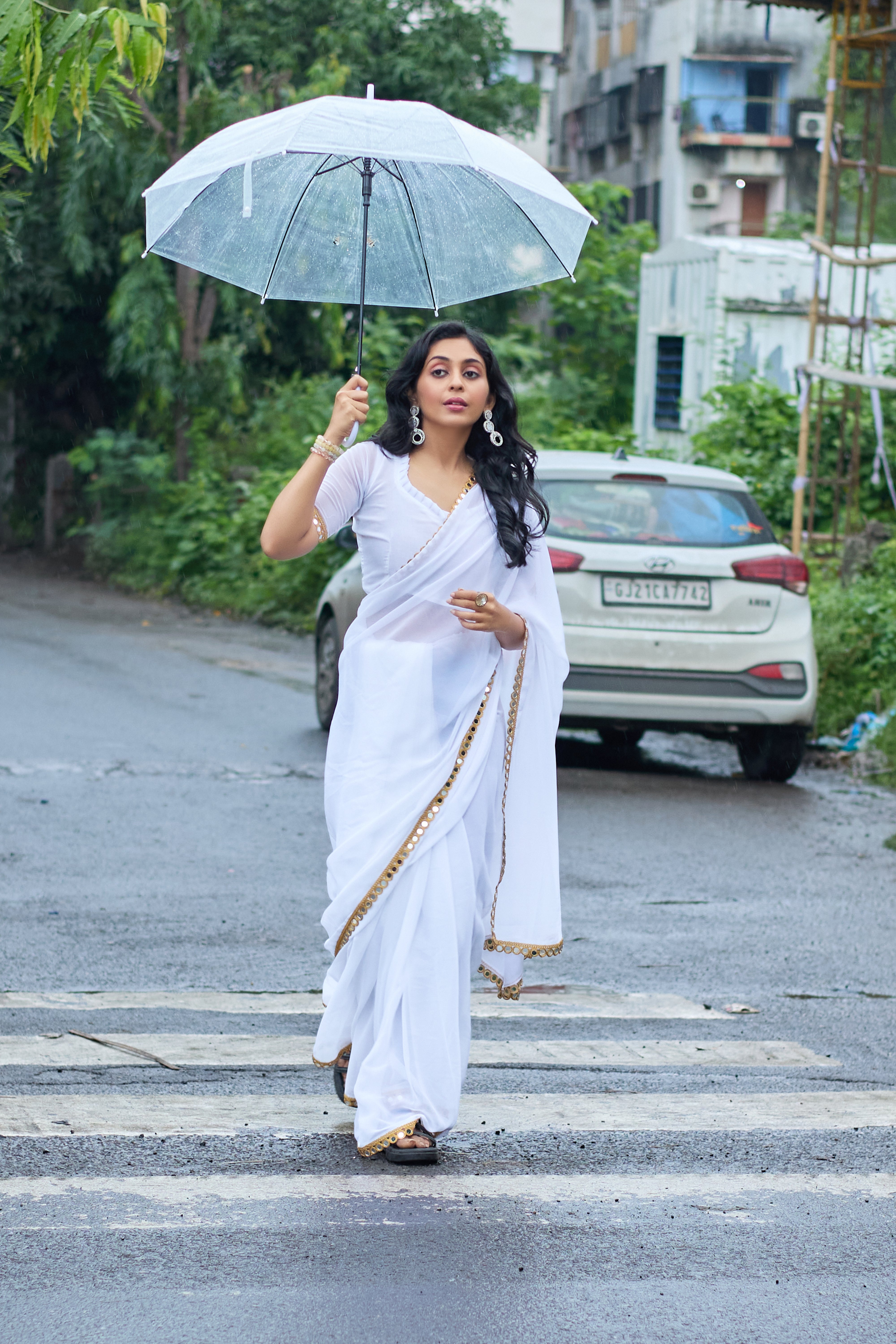 Elegant White Georgette Saree with Golden Embellished Border