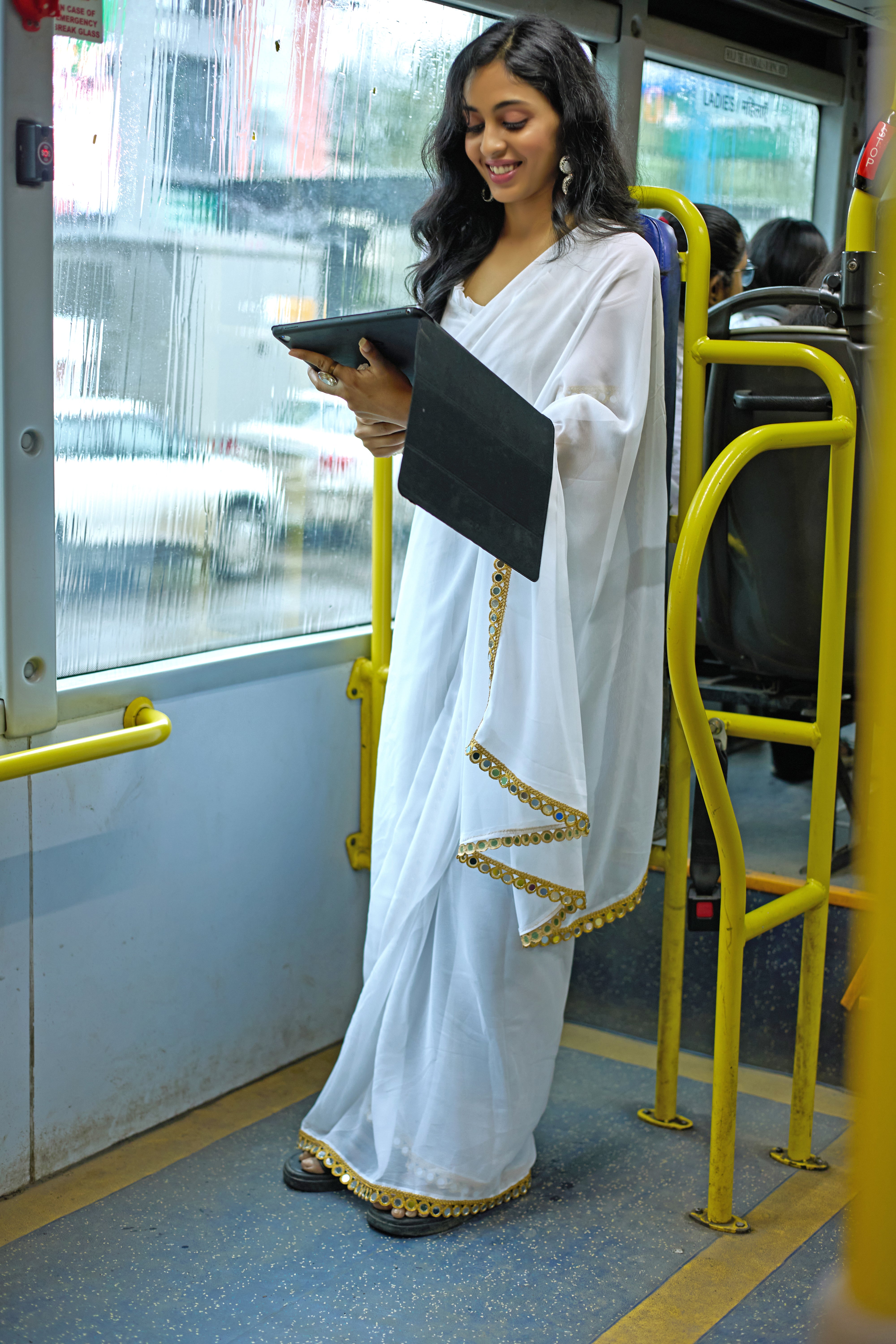 Elegant White Georgette Saree with Golden Embellished Border