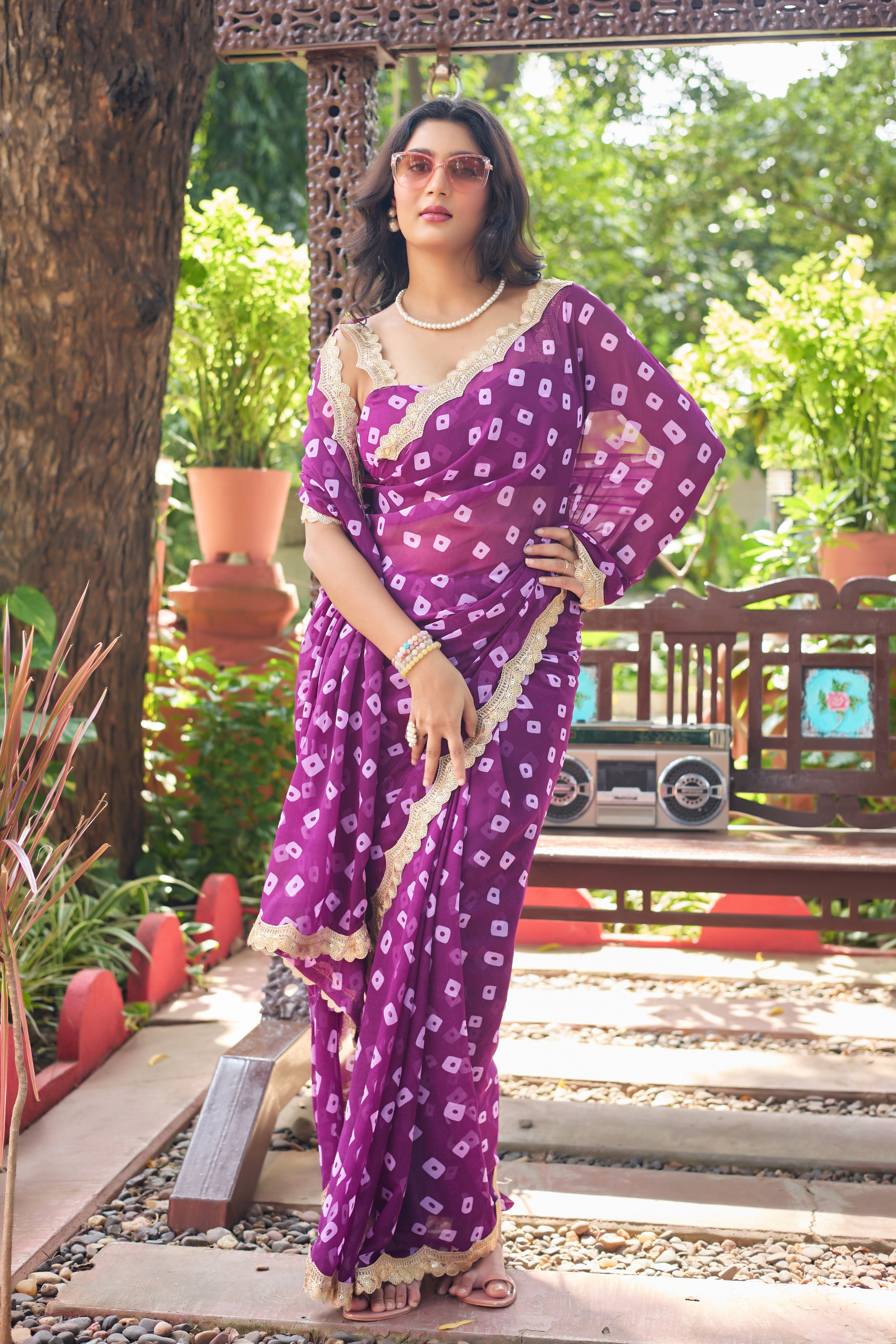 Fuchsia Bandhani Georgette Saree with Golden Lace Border