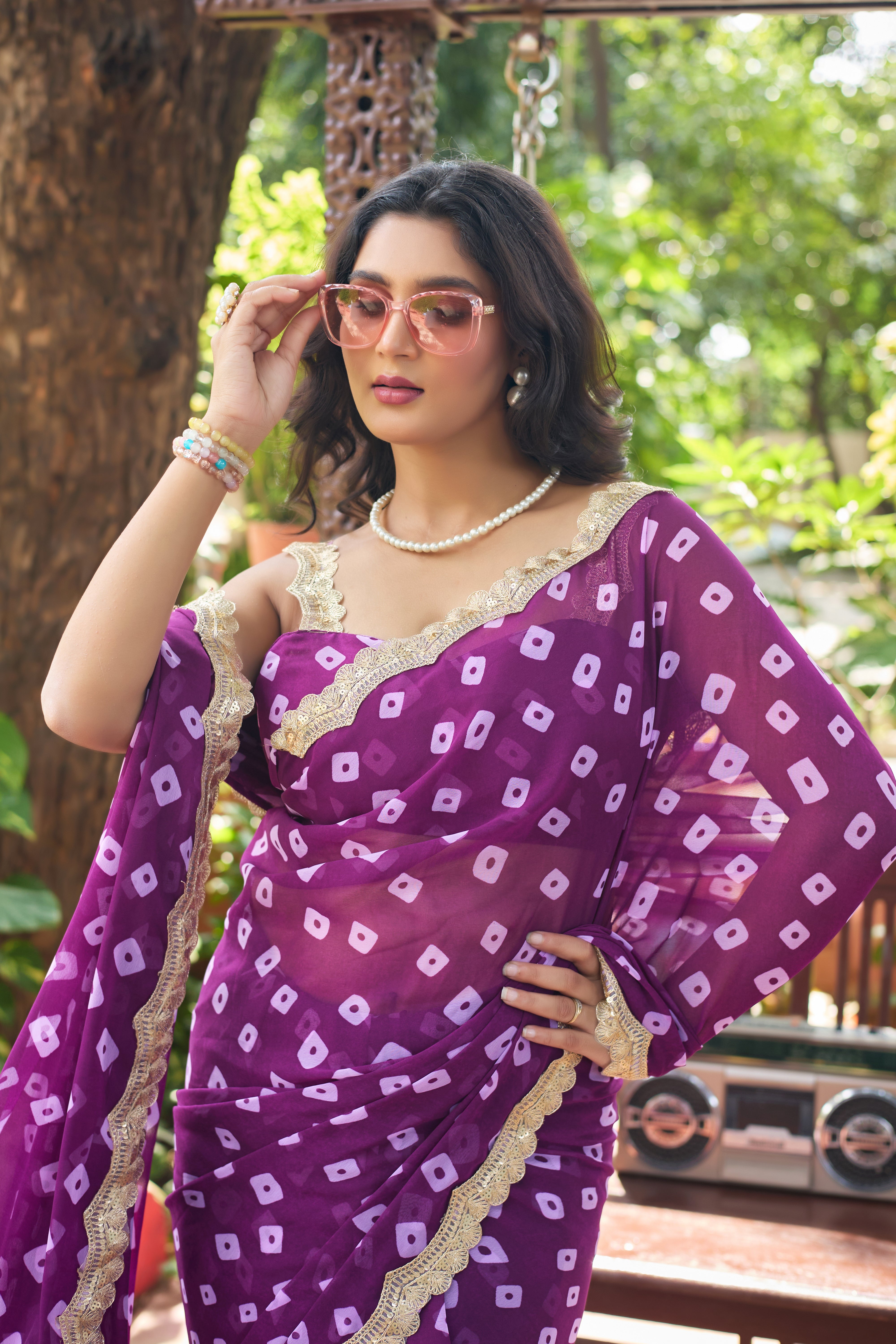 Fuchsia Bandhani Georgette Saree with Golden Lace Border
