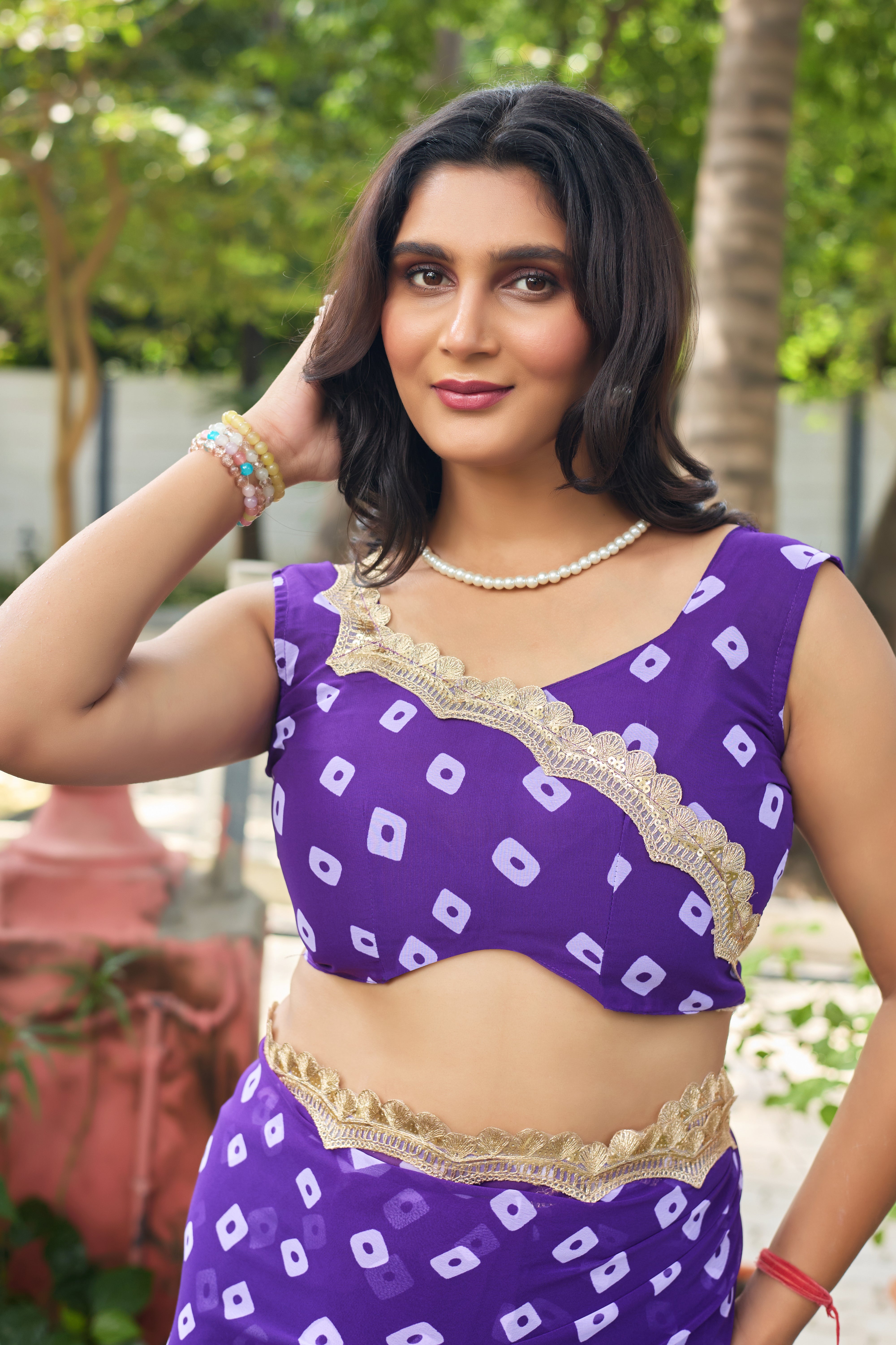 Fuchsia Bandhani Georgette Saree with Golden Lace Border