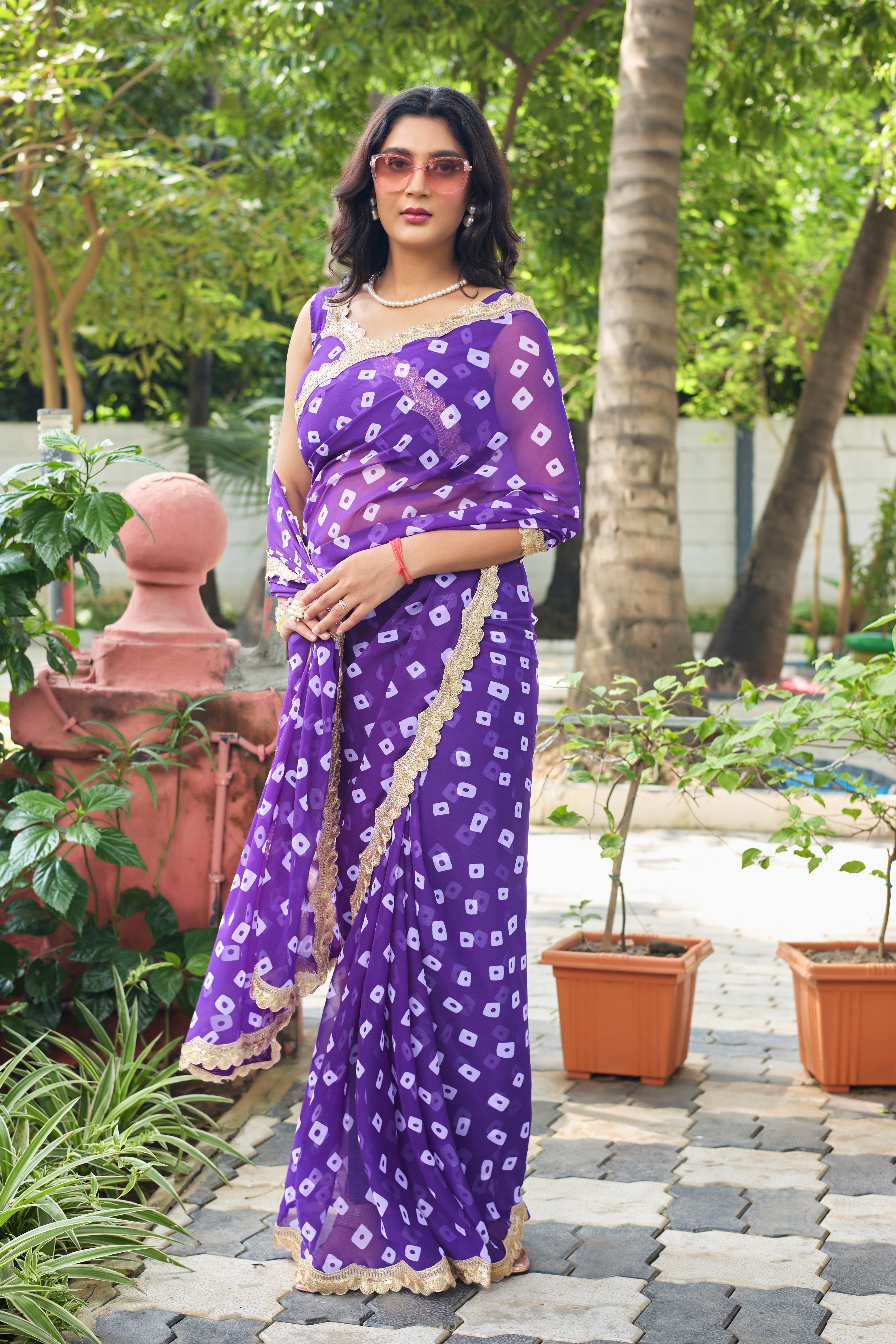 Fuchsia Bandhani Georgette Saree with Golden Lace Border