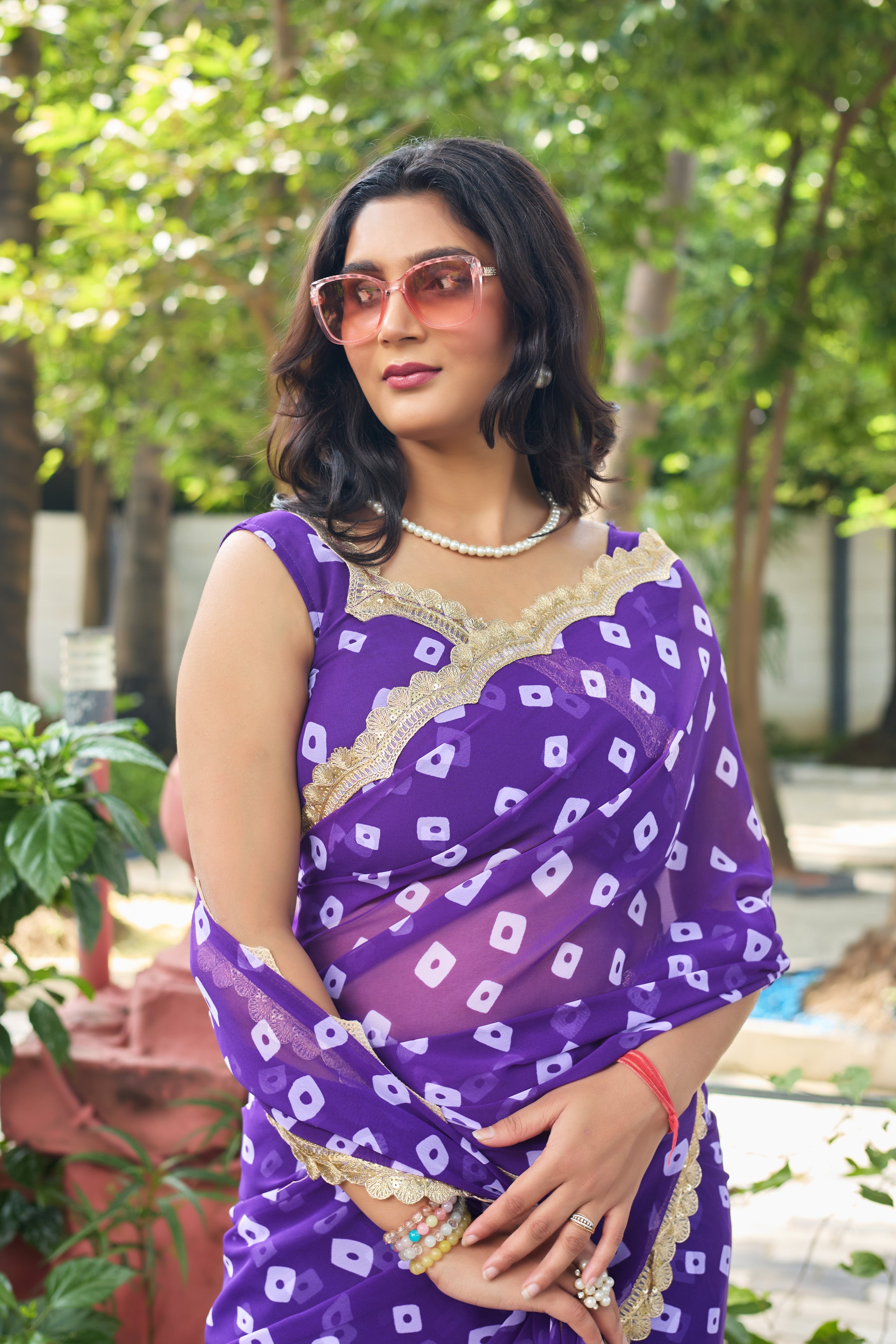 Fuchsia Bandhani Georgette Saree with Golden Lace Border
