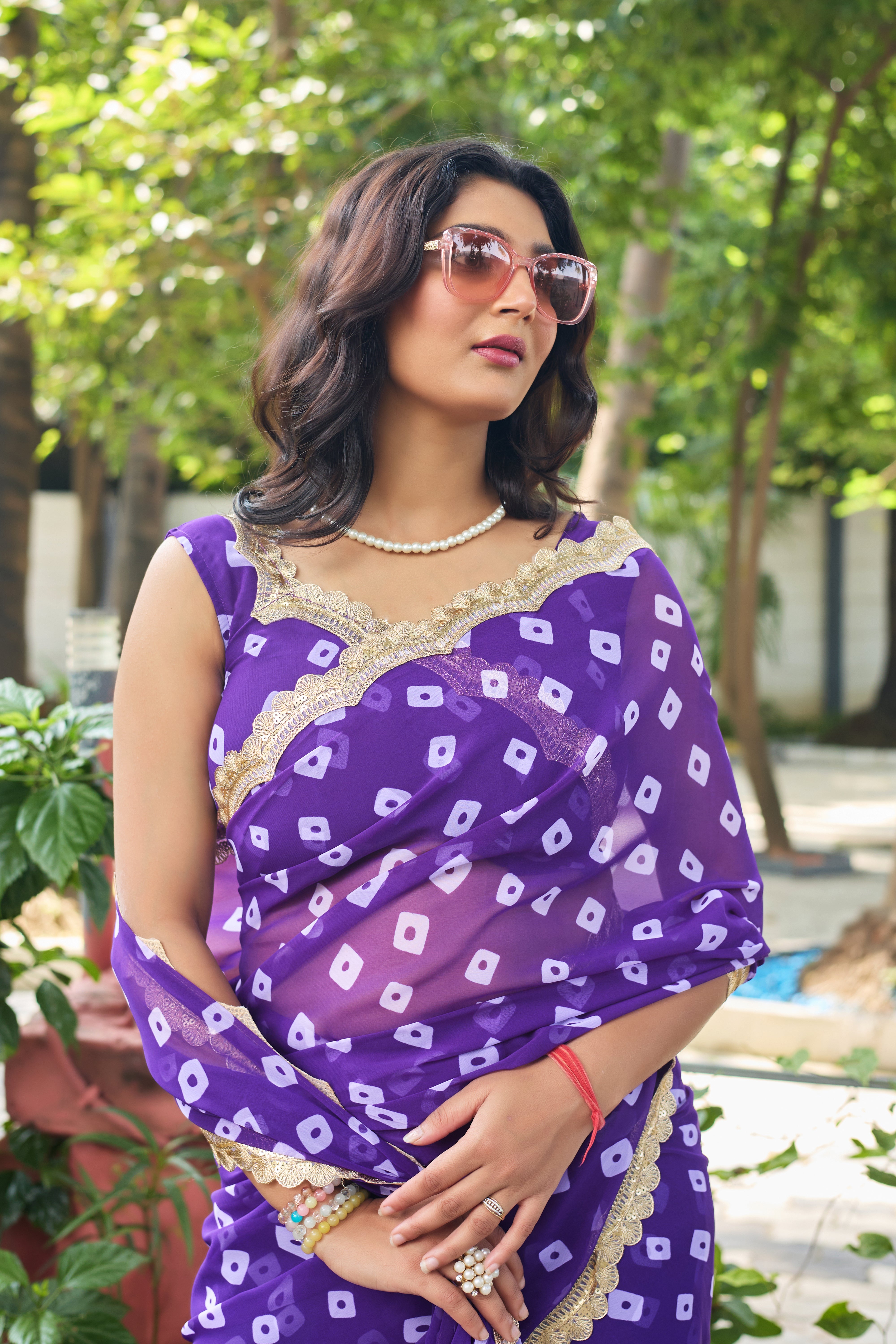 Fuchsia Bandhani Georgette Saree with Golden Lace Border