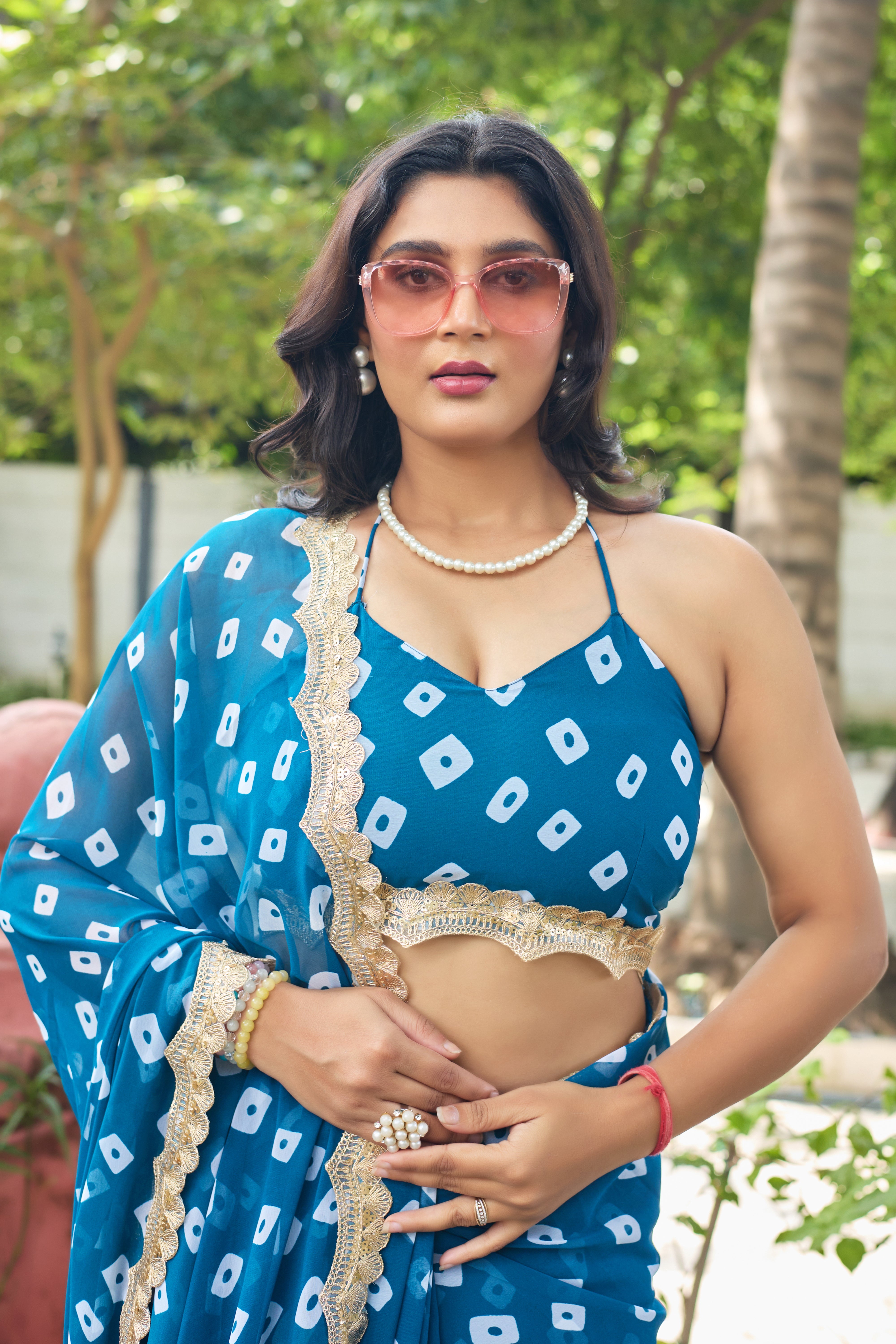 Fuchsia Bandhani Georgette Saree with Golden Lace Border