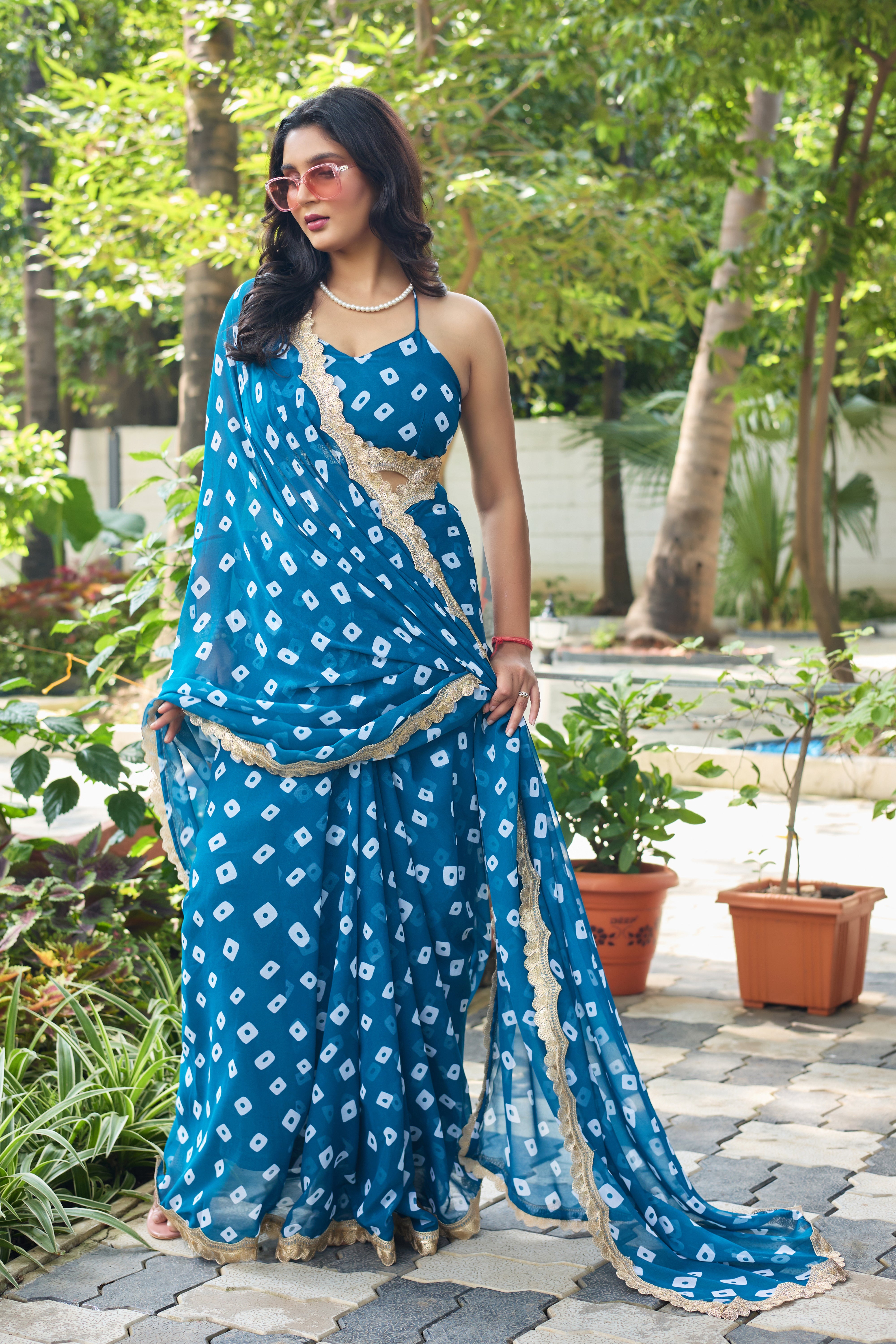 Fuchsia Bandhani Georgette Saree with Golden Lace Border