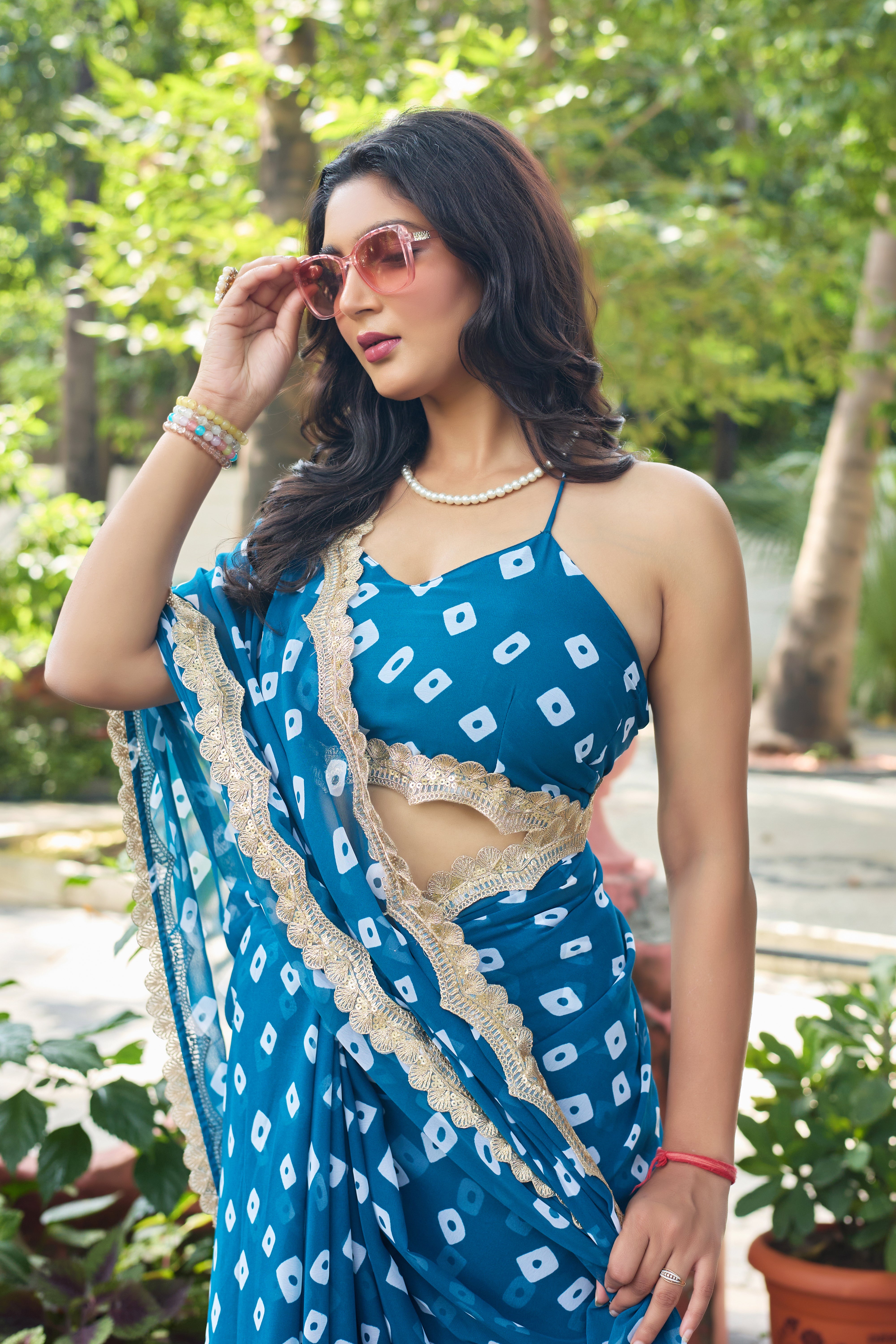 Fuchsia Bandhani Georgette Saree with Golden Lace Border