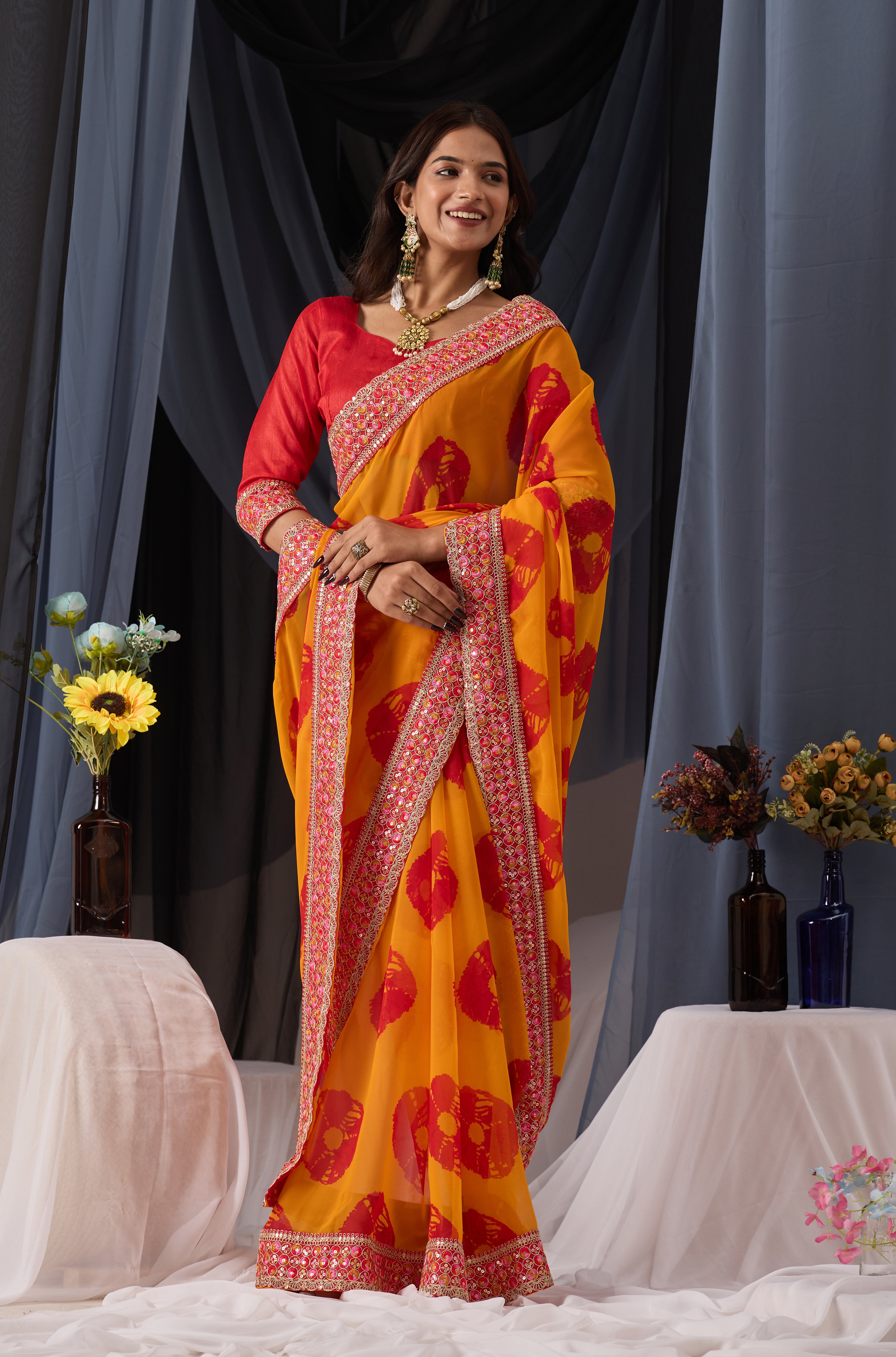 Scarlet Musted Batik Georgette Saree with Embroidered Border