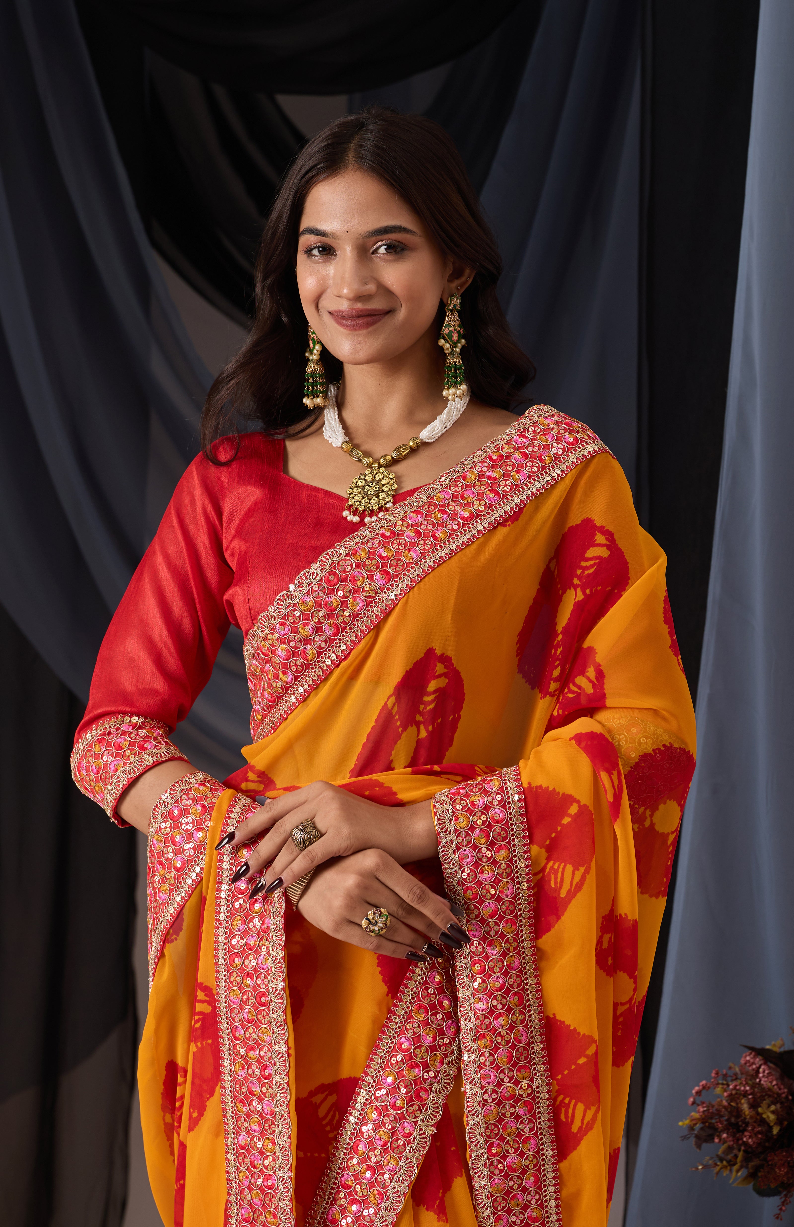 Scarlet Musted Batik Georgette Saree with Embroidered Border