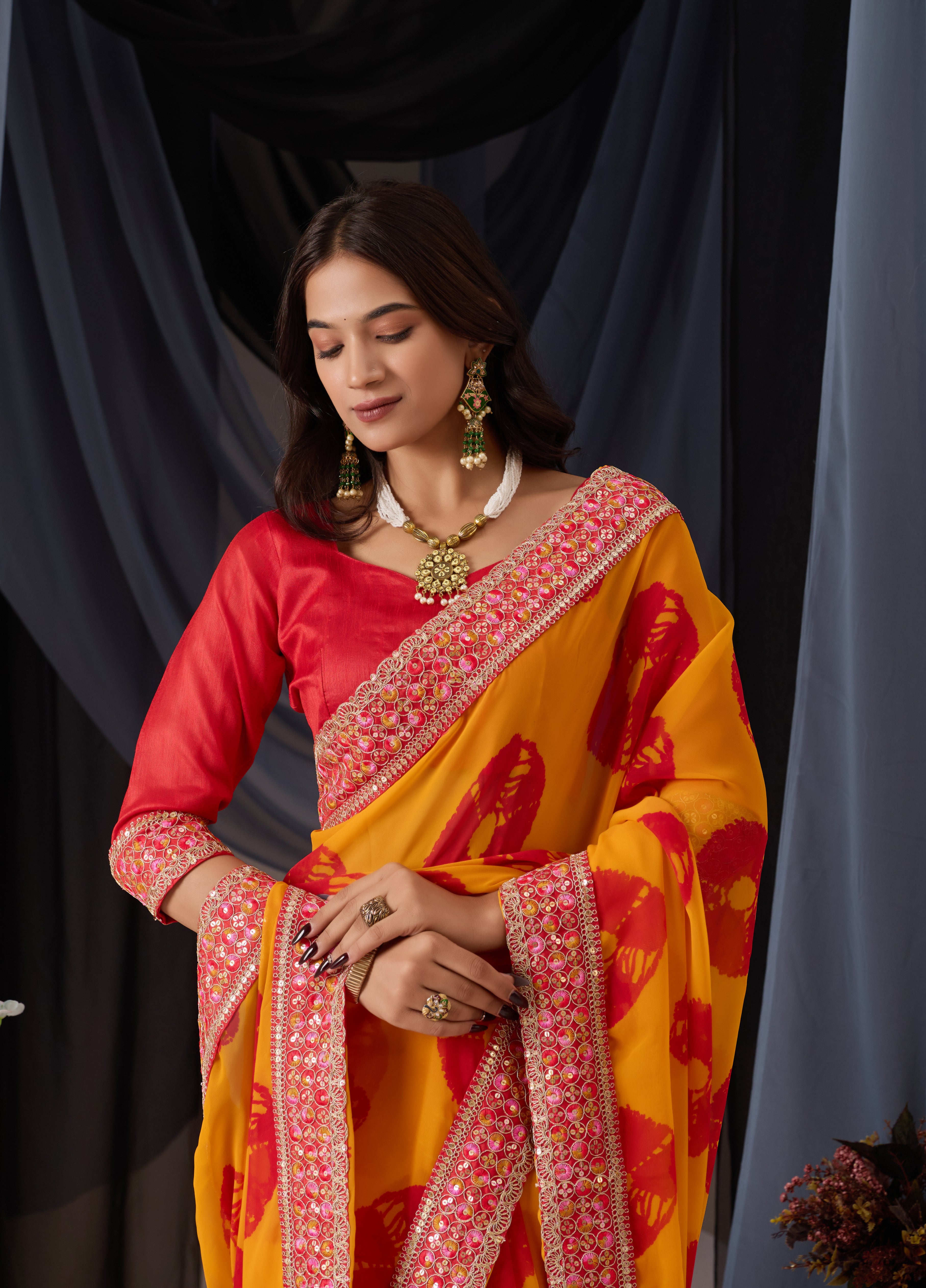 Scarlet Musted Batik Georgette Saree with Embroidered Border