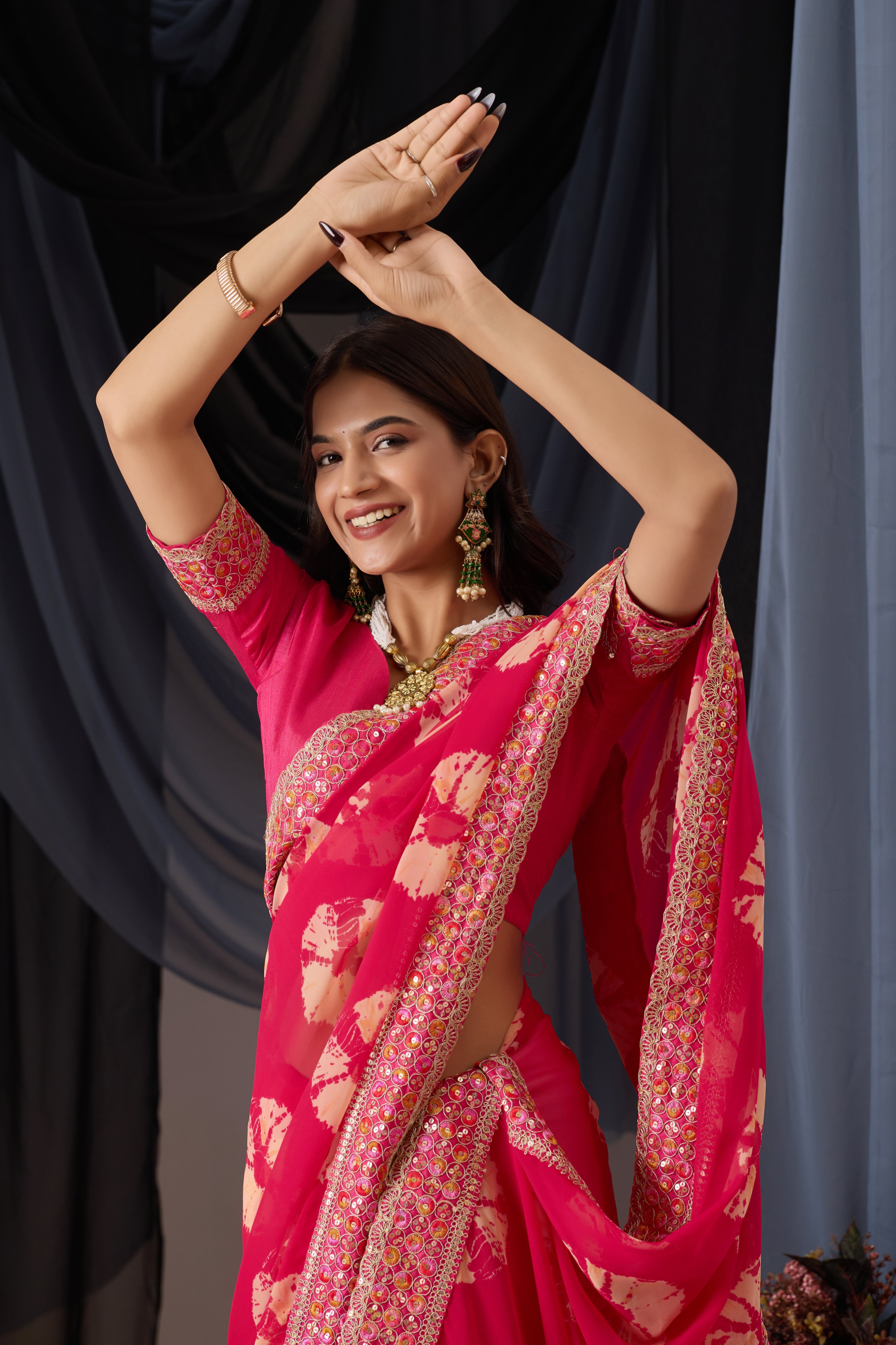 Scarlet Pink Batik Georgette Saree with Embroidered Border