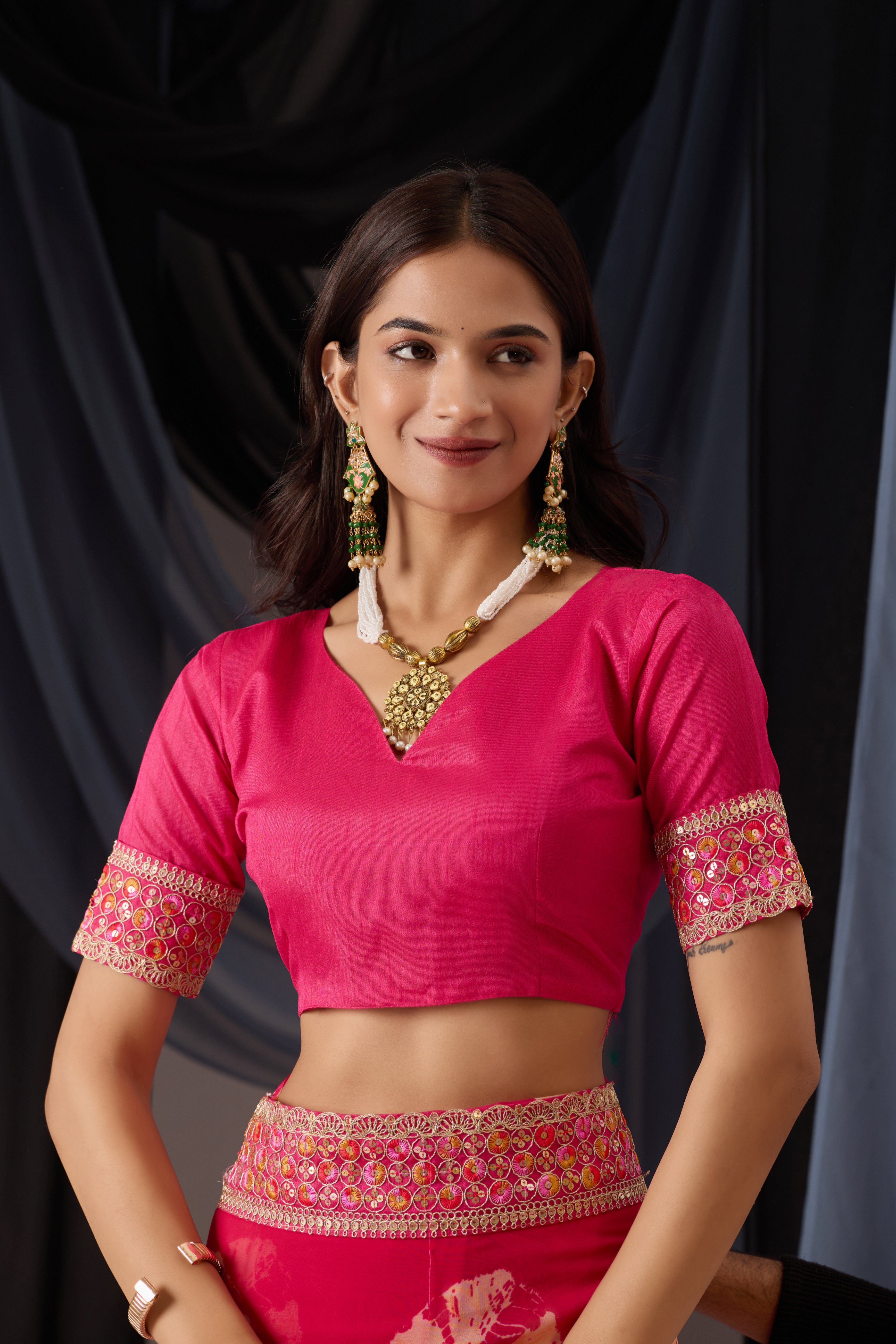 Scarlet Pink Batik Georgette Saree with Embroidered Border