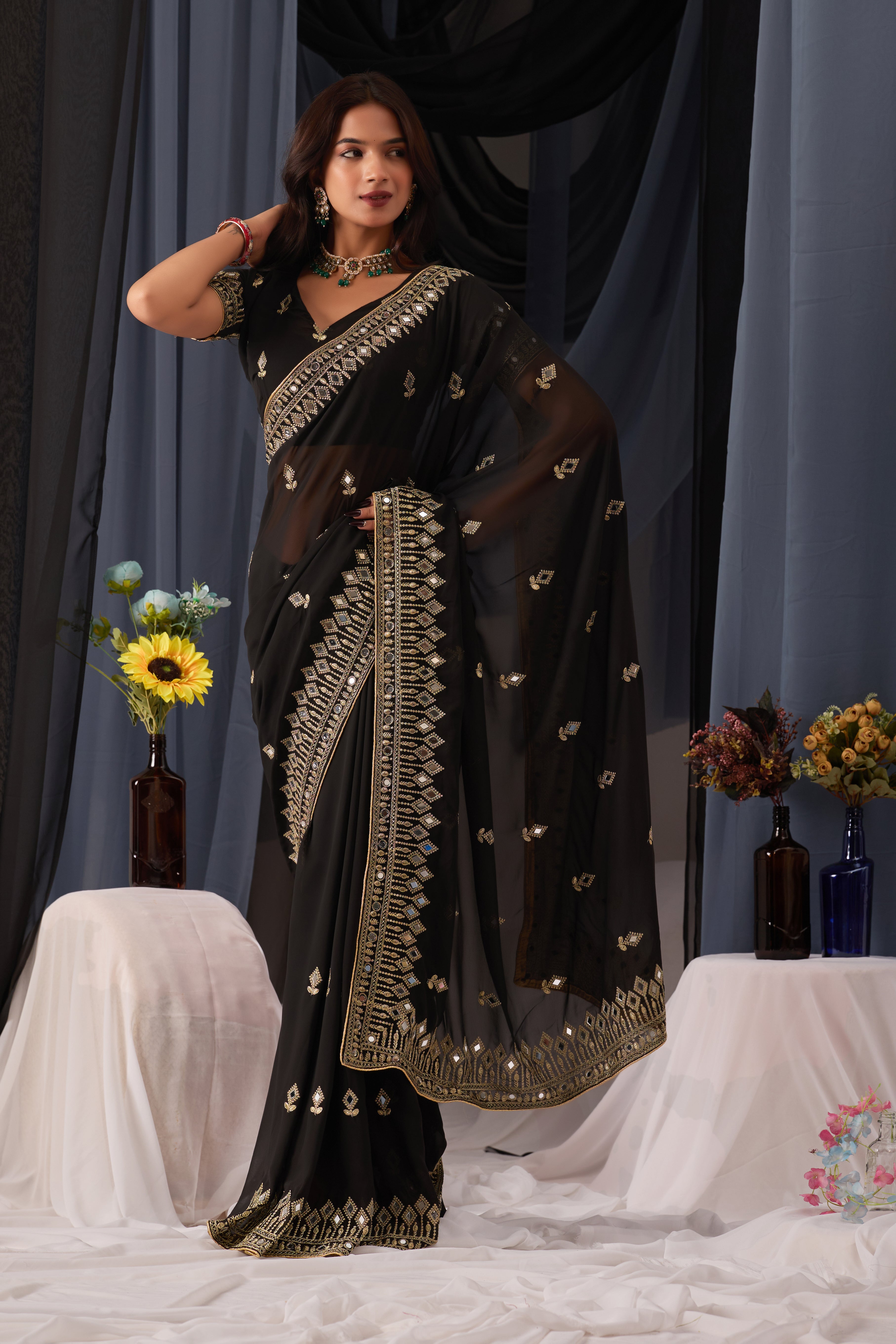 Elegant Black Georgette Saree with Golden Embroidered Border