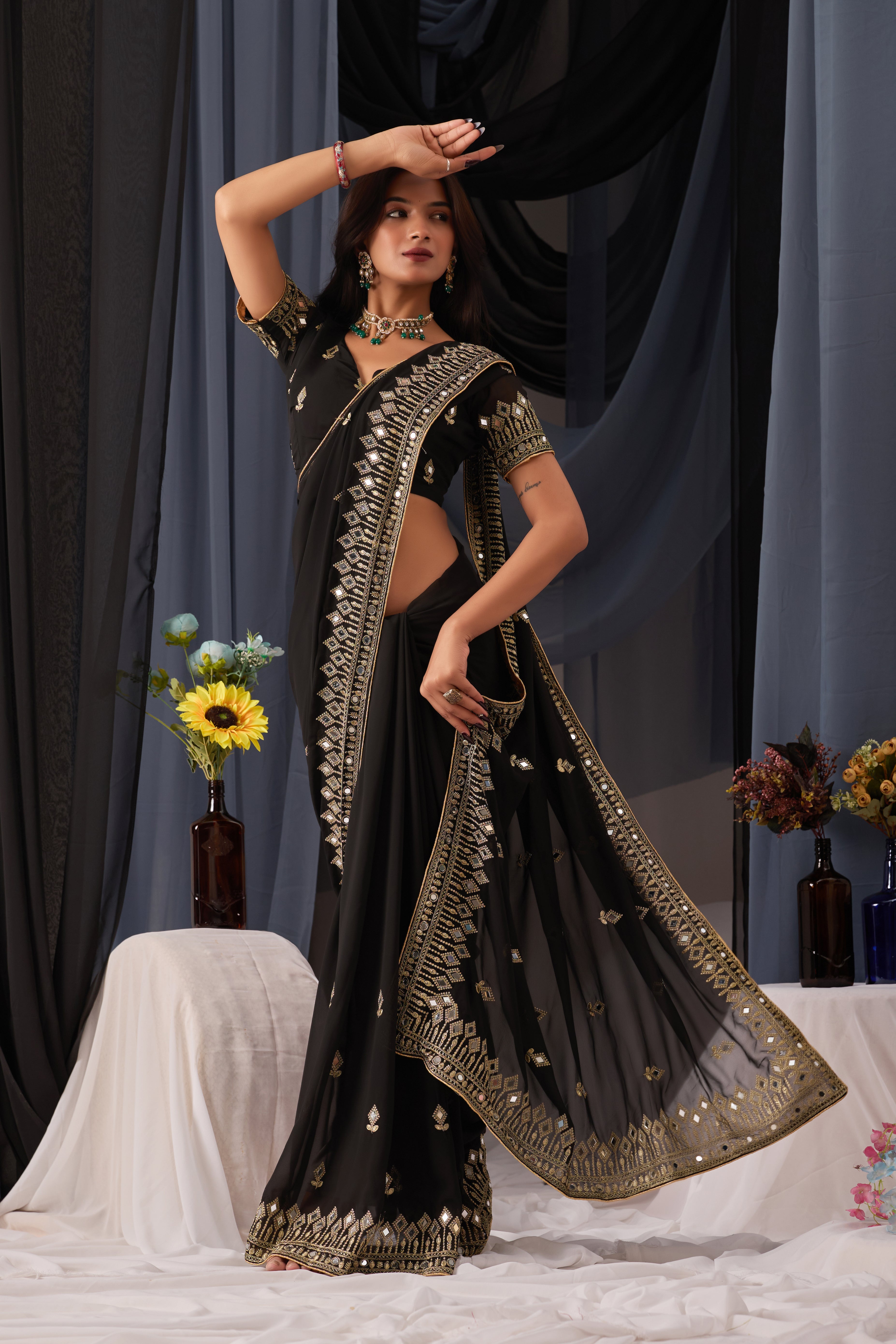 Elegant Black Georgette Saree with Golden Embroidered Border