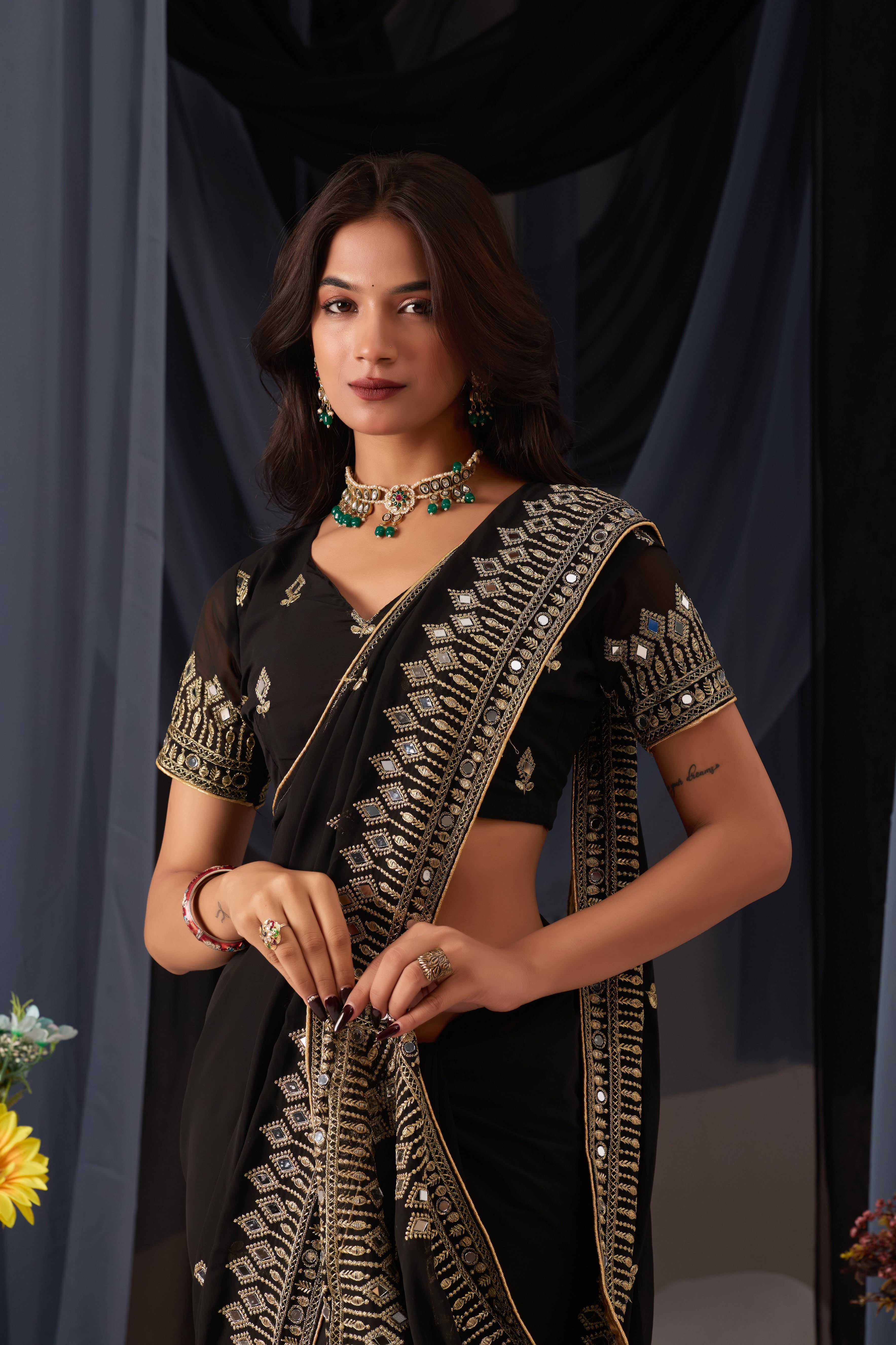 Elegant Black Georgette Saree with Golden Embroidered Border
