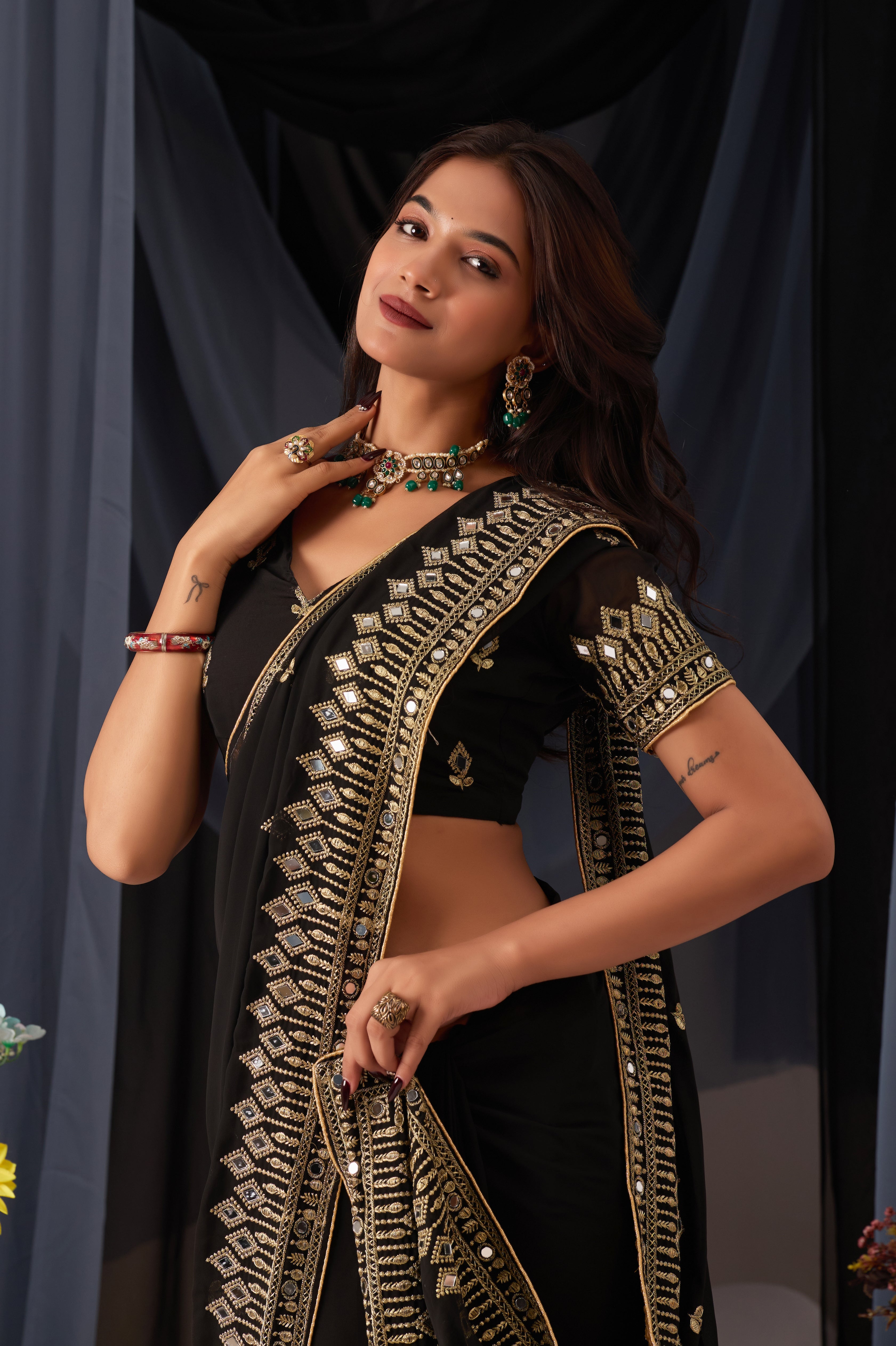 Elegant Black Georgette Saree with Golden Embroidered Border