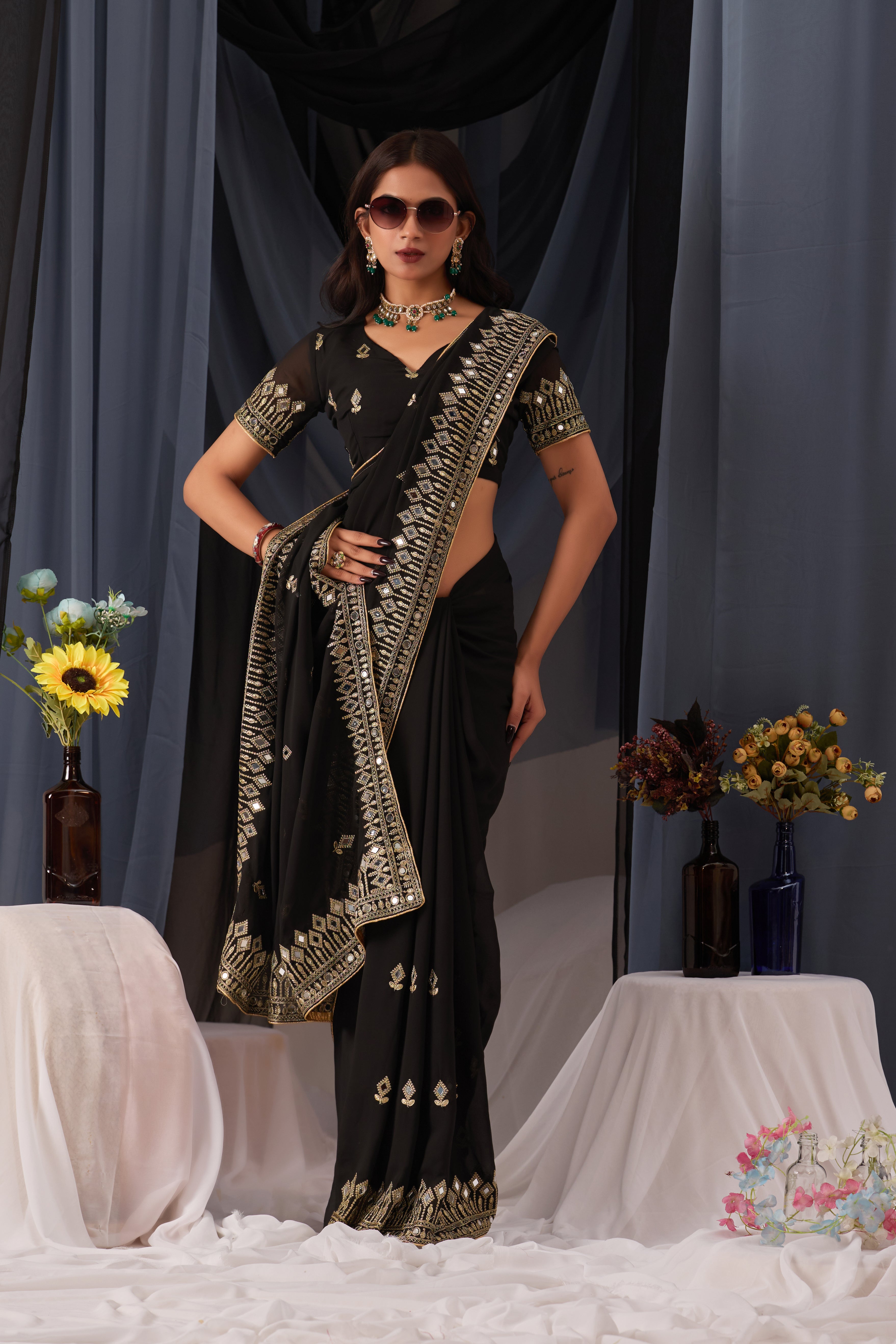 Elegant Black Georgette Saree with Golden Embroidered Border