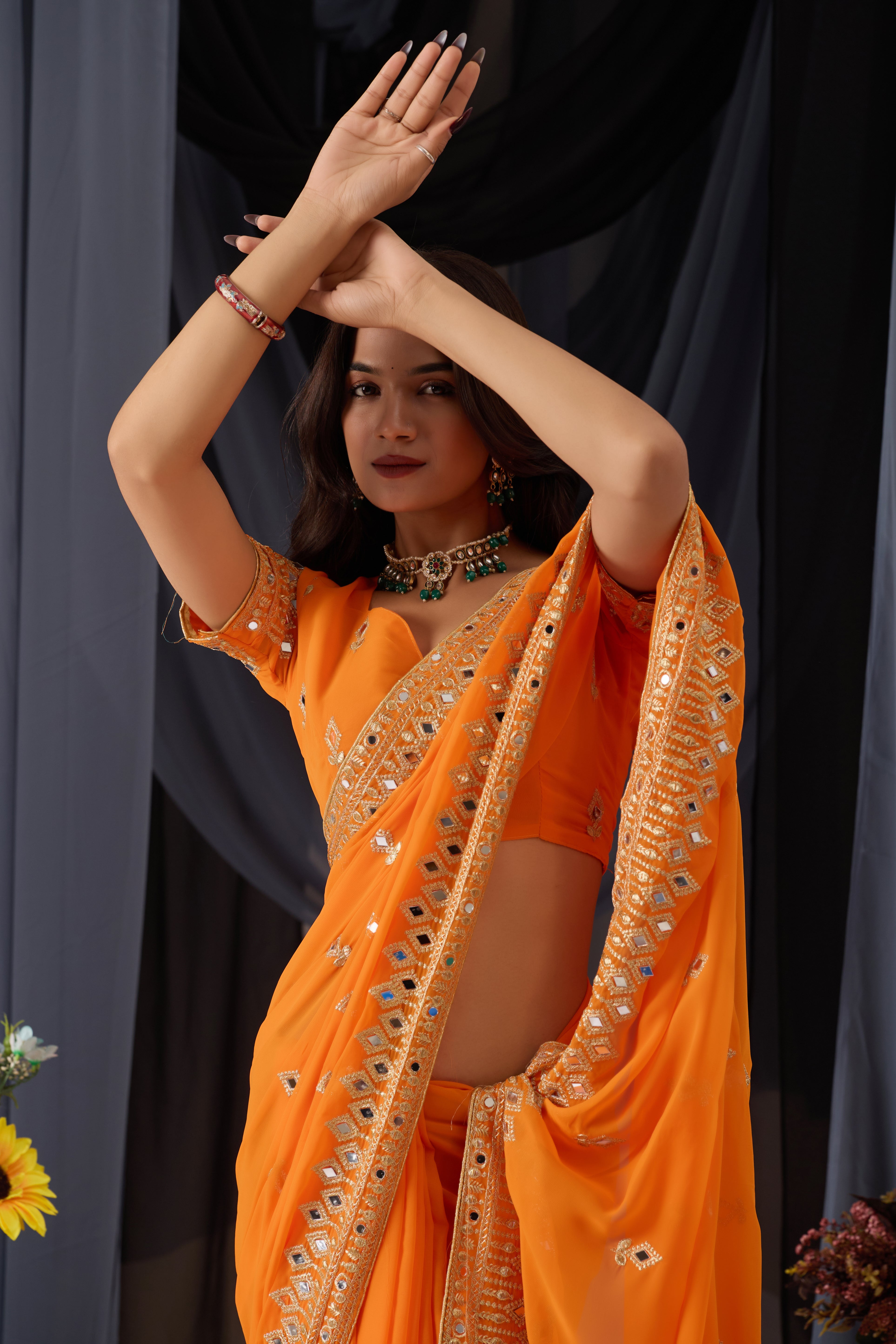 Elegant Orange Georgette Saree with Golden Embroidered Border