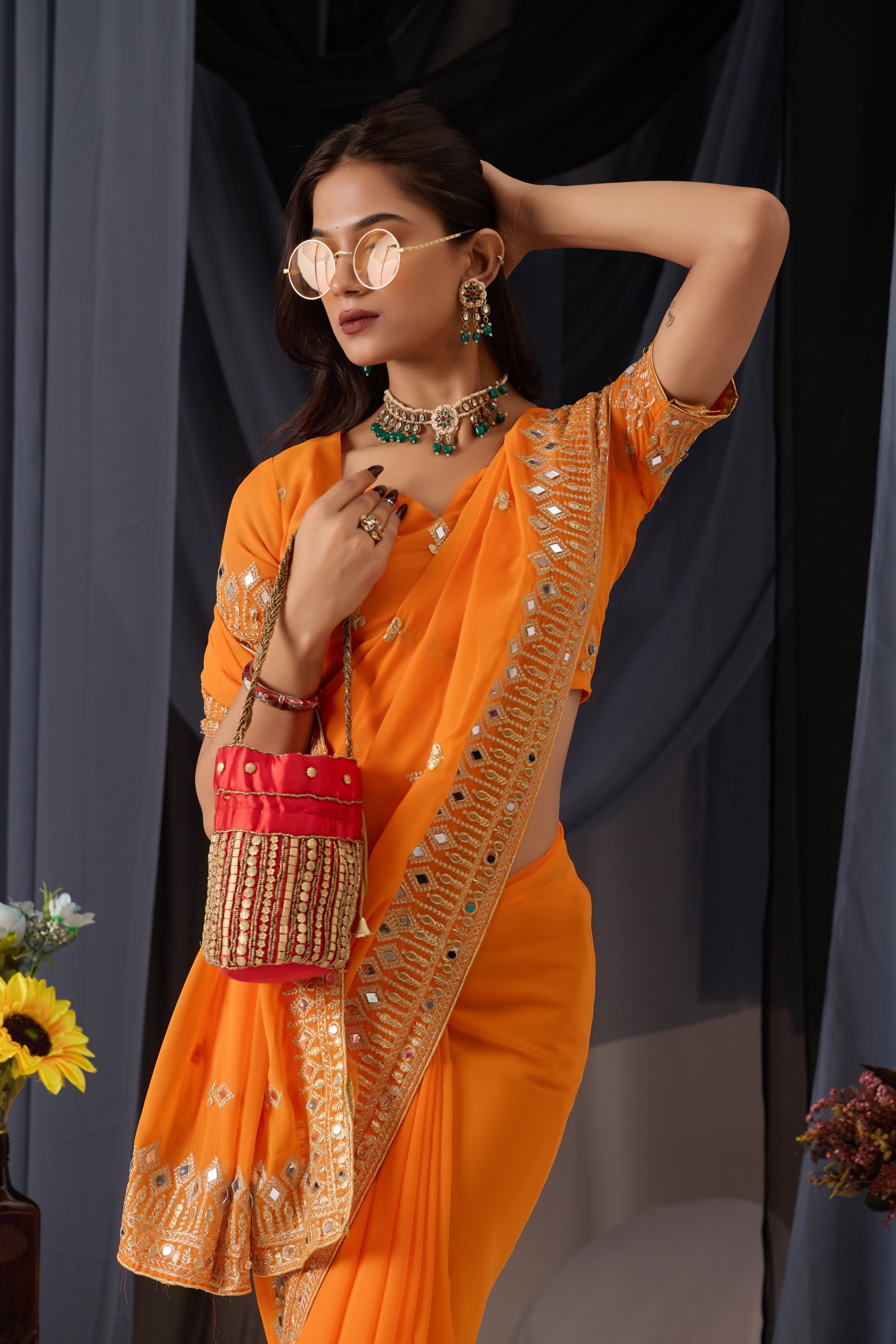 Elegant Orange Georgette Saree with Golden Embroidered Border