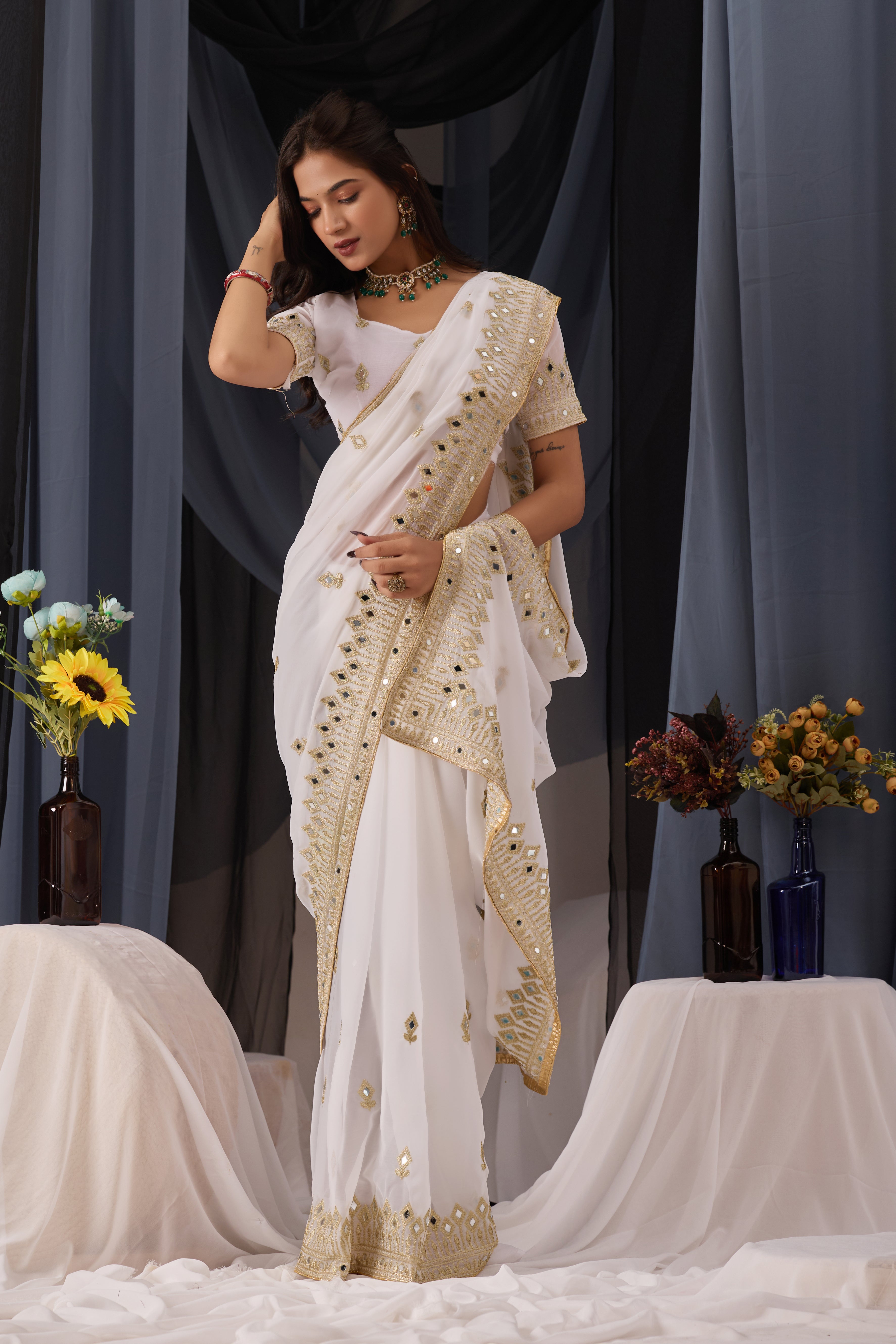 Elegant White Georgette Saree with Golden Embroidered Border