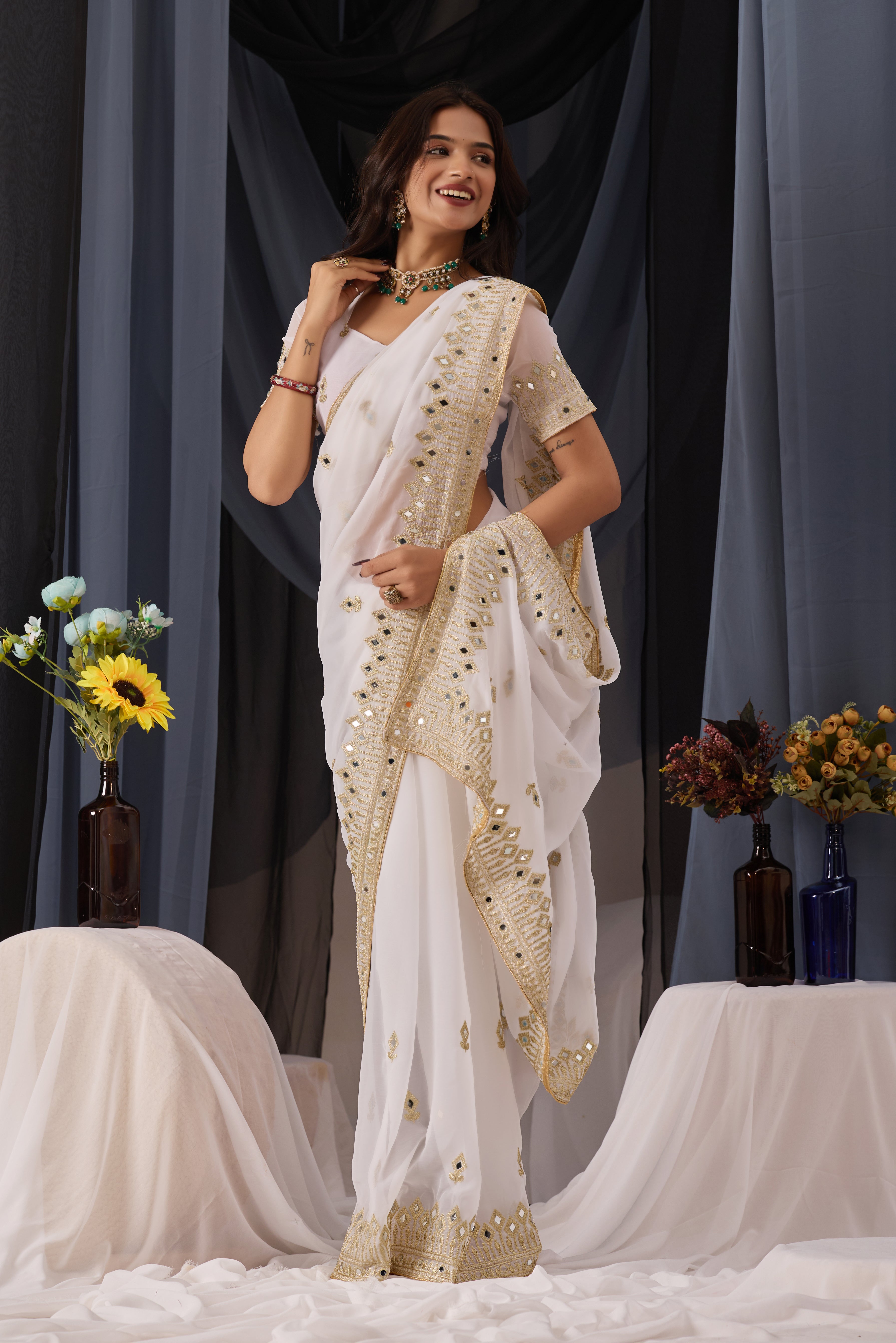 Elegant White Georgette Saree with Golden Embroidered Border