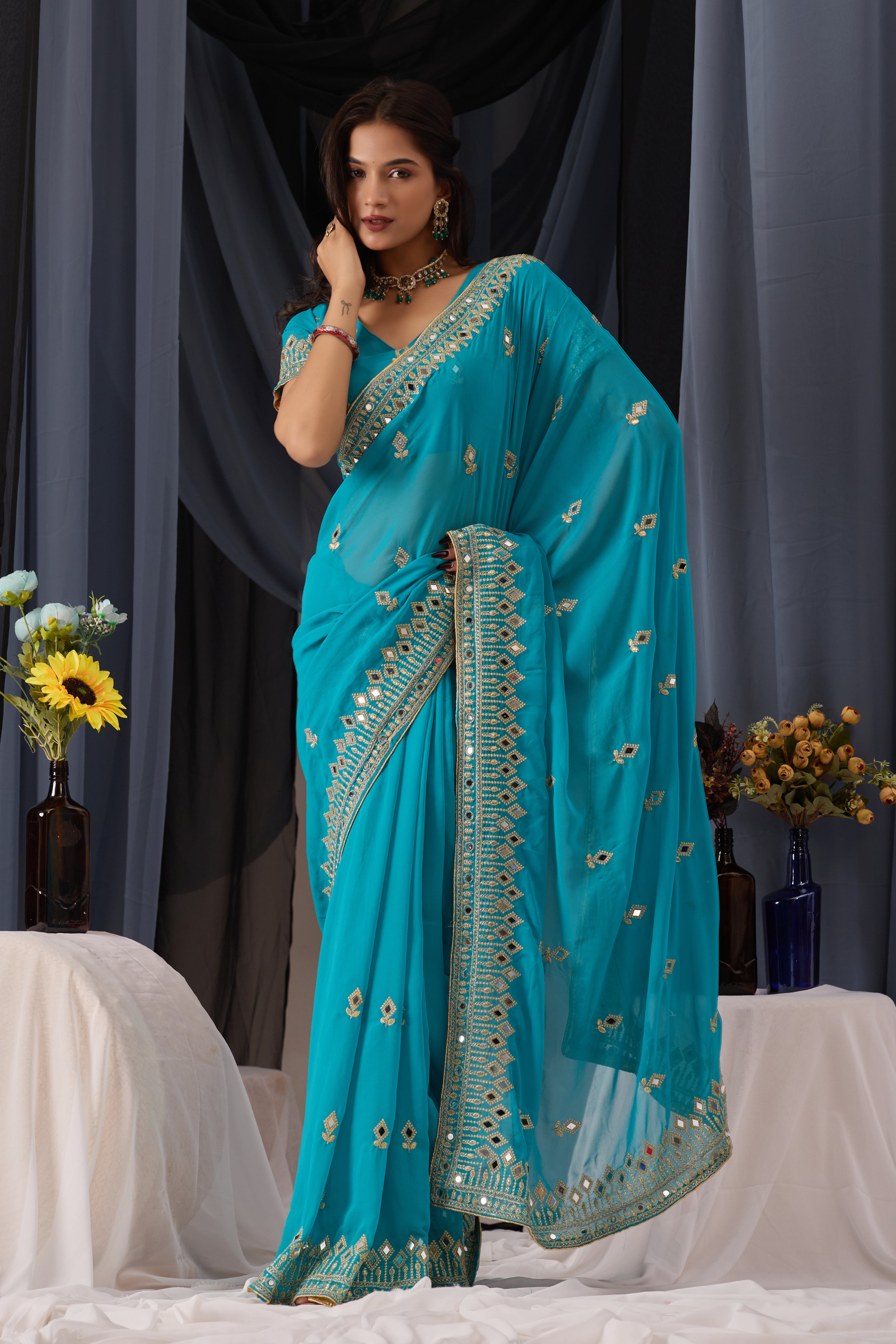 Elegant Sky Georgette Saree with Golden Embroidered Border