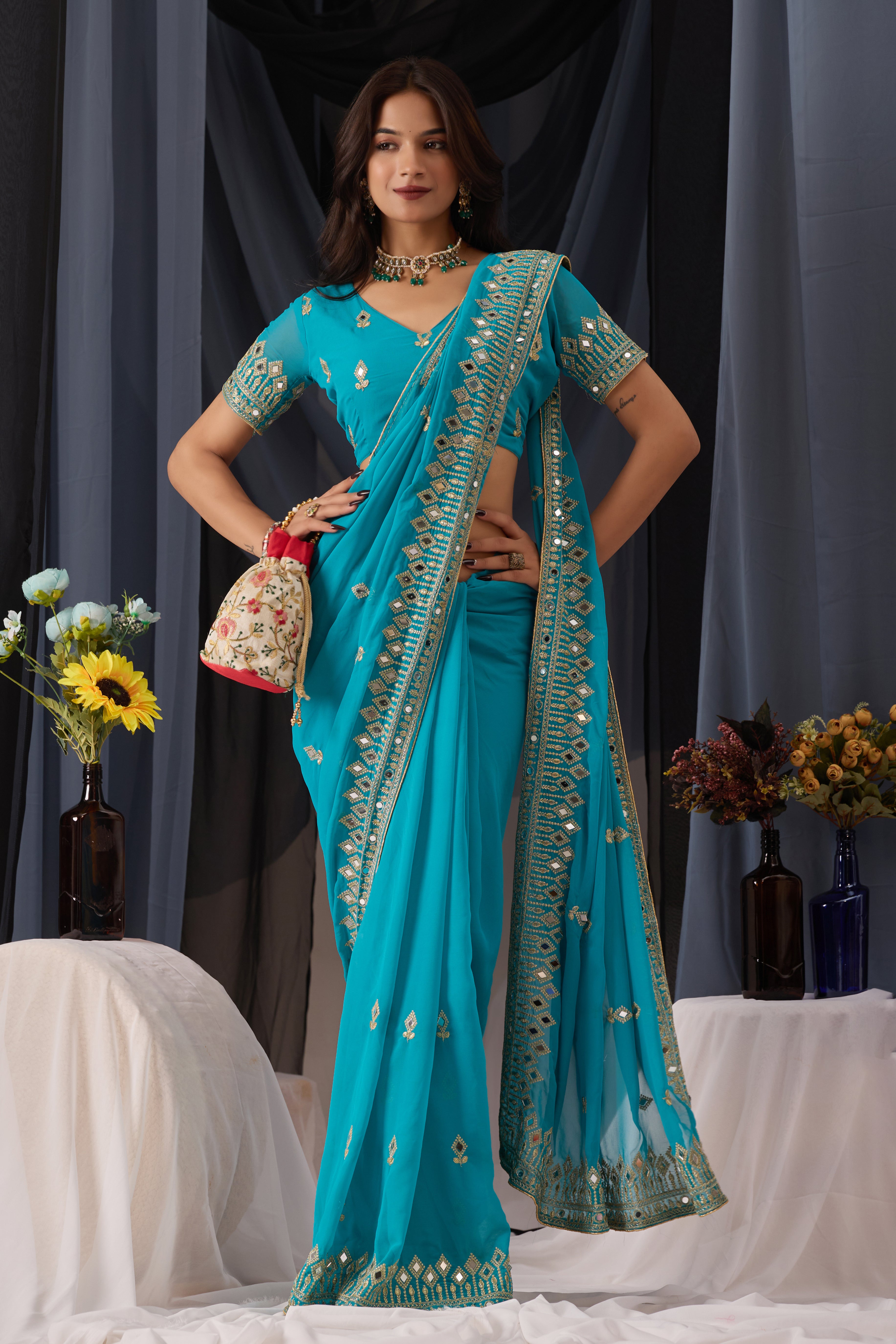 Elegant Sky Georgette Saree with Golden Embroidered Border