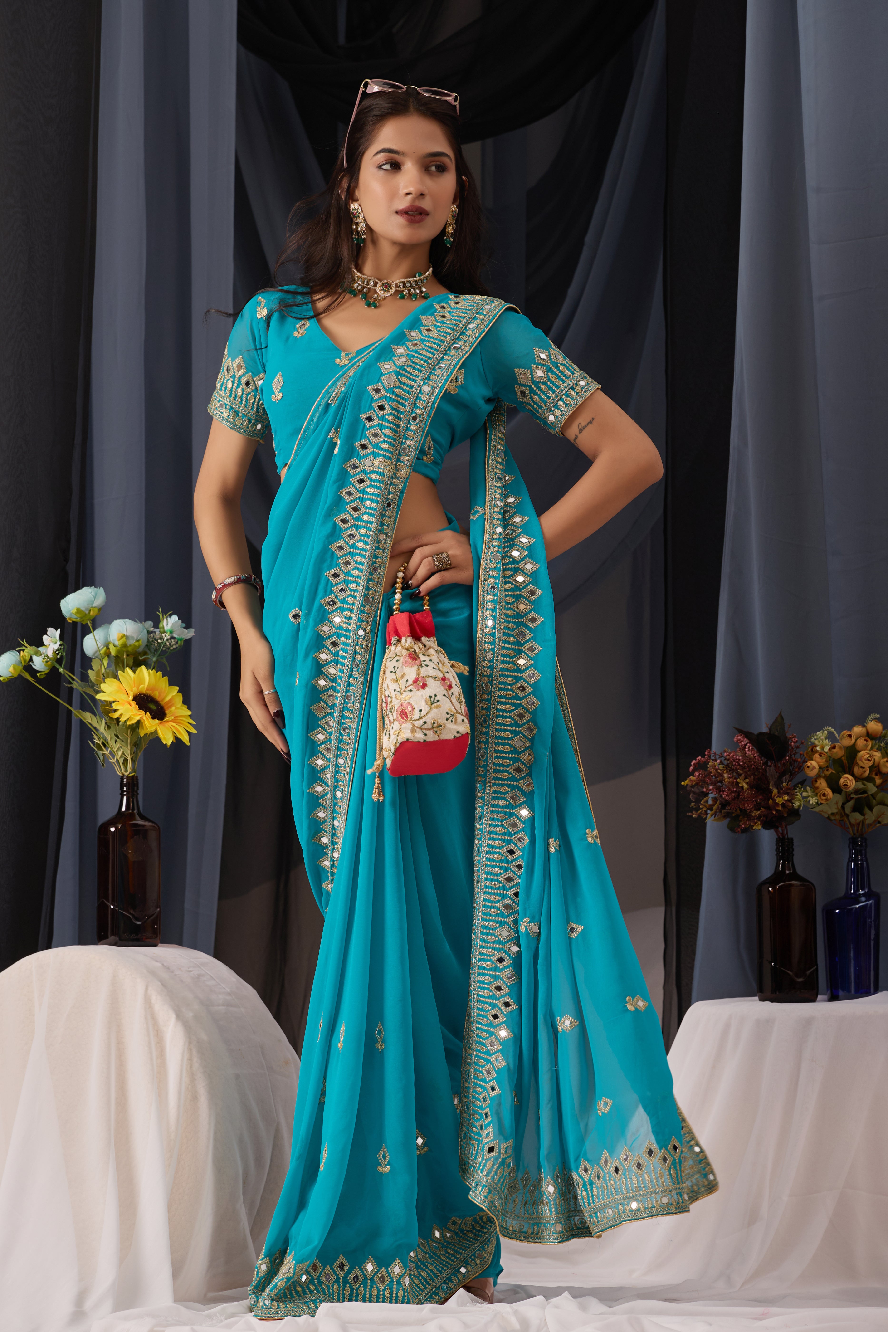 Elegant Sky Georgette Saree with Golden Embroidered Border