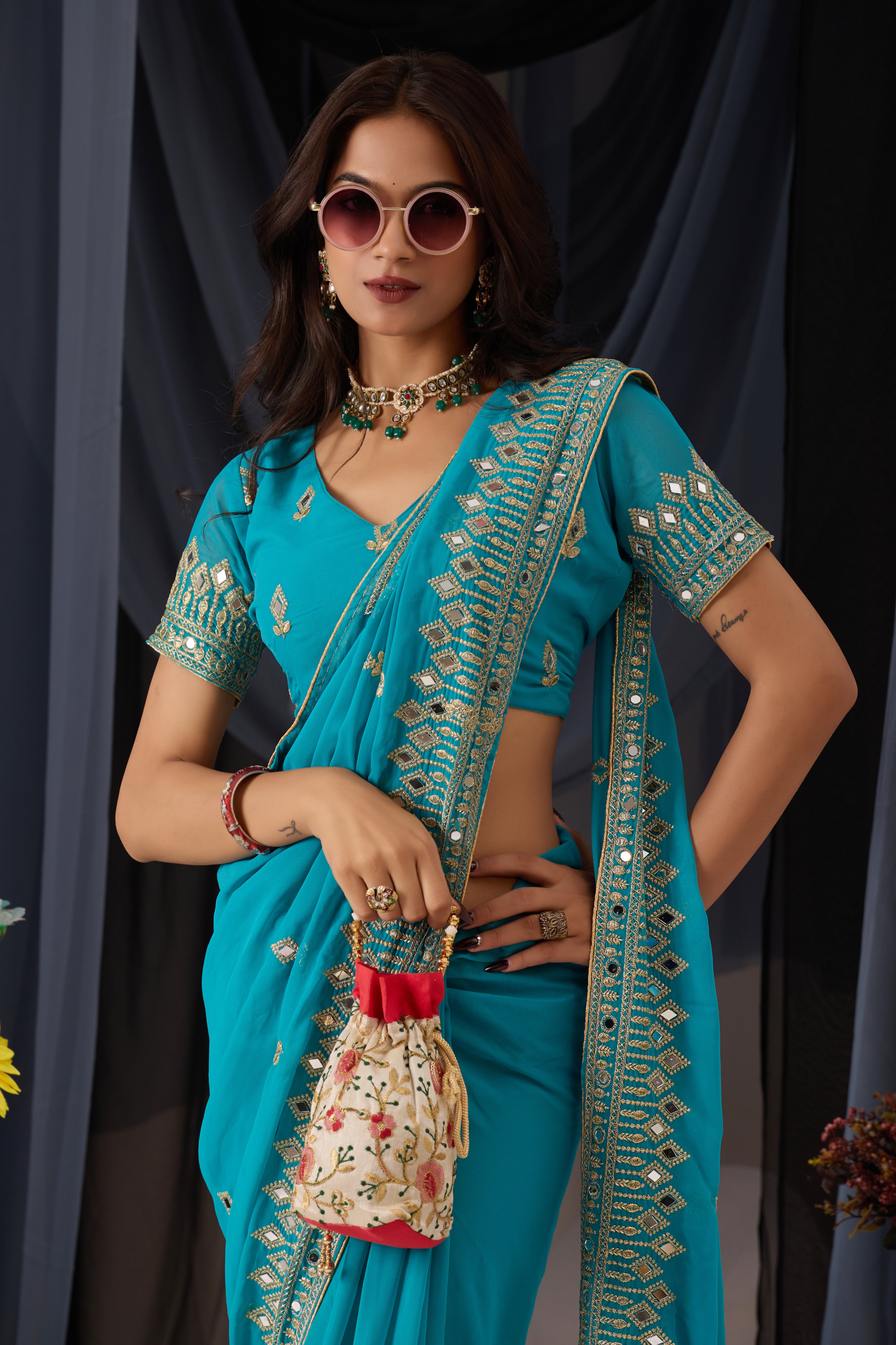 Elegant Sky Georgette Saree with Golden Embroidered Border