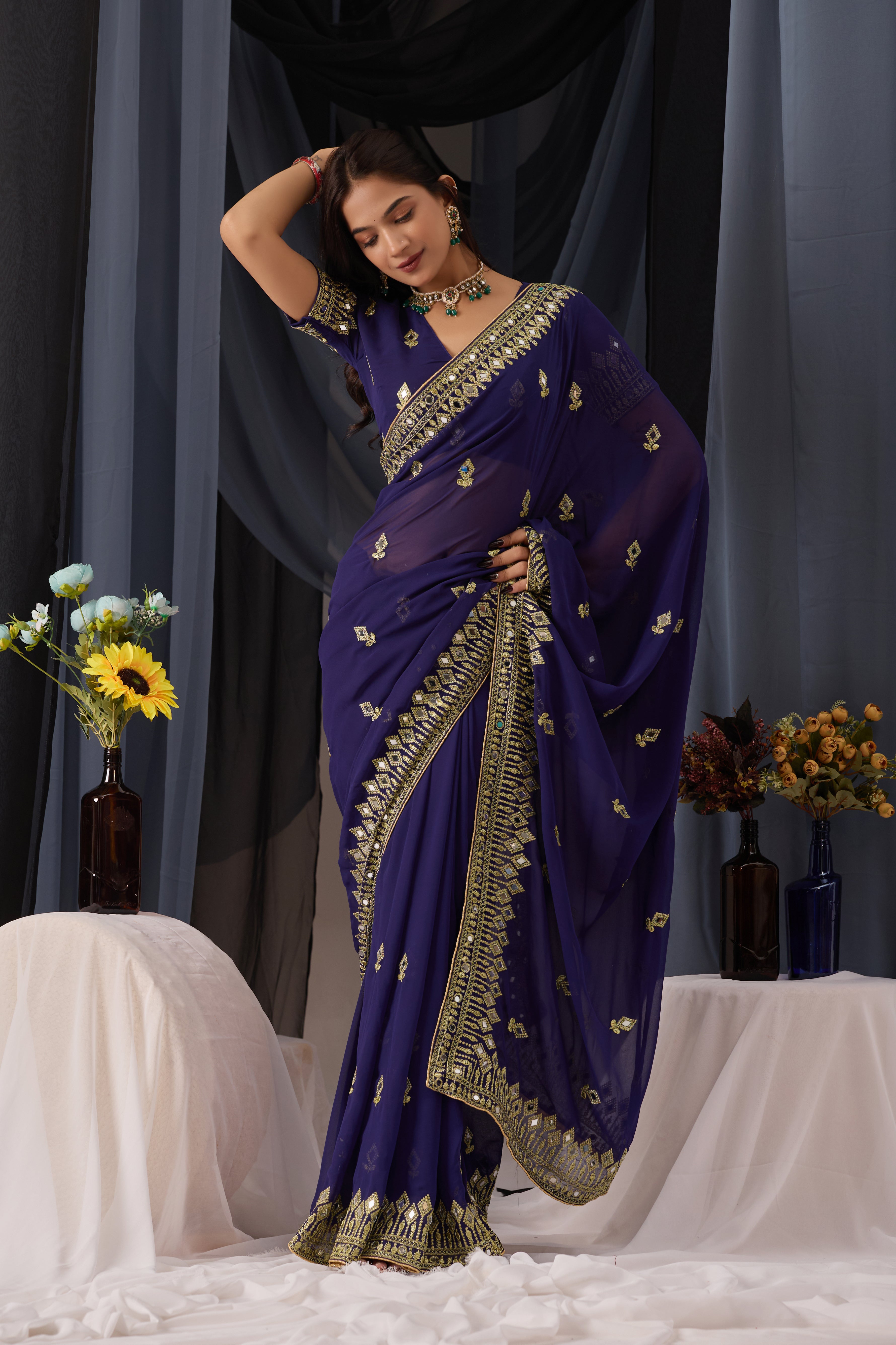 Elegant Navy Blue Georgette Saree with Golden Embroidered Border